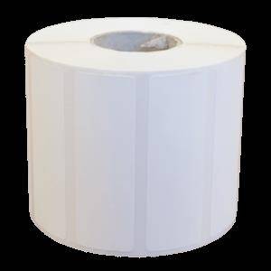 Weiße Toilettenpapierrolle von oben auf einem einfachen Hintergrund betrachtet.