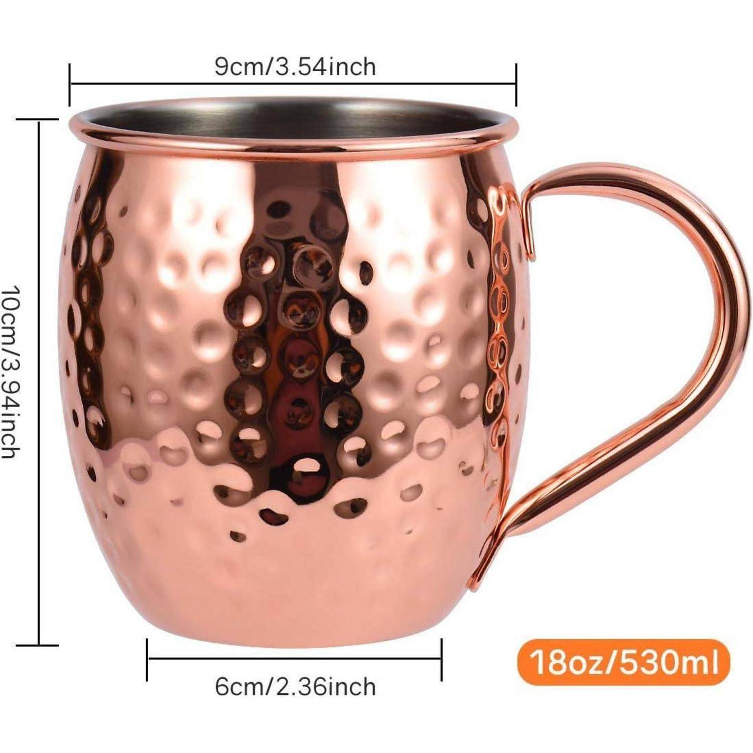 Eine gehämmerte Kupfertasse mit Henkel, mit einem Durchmesser von 9 cm und einer Höhe von 10 cm, mit einem Fassungsvermögen von 18 oz (530 ml).
