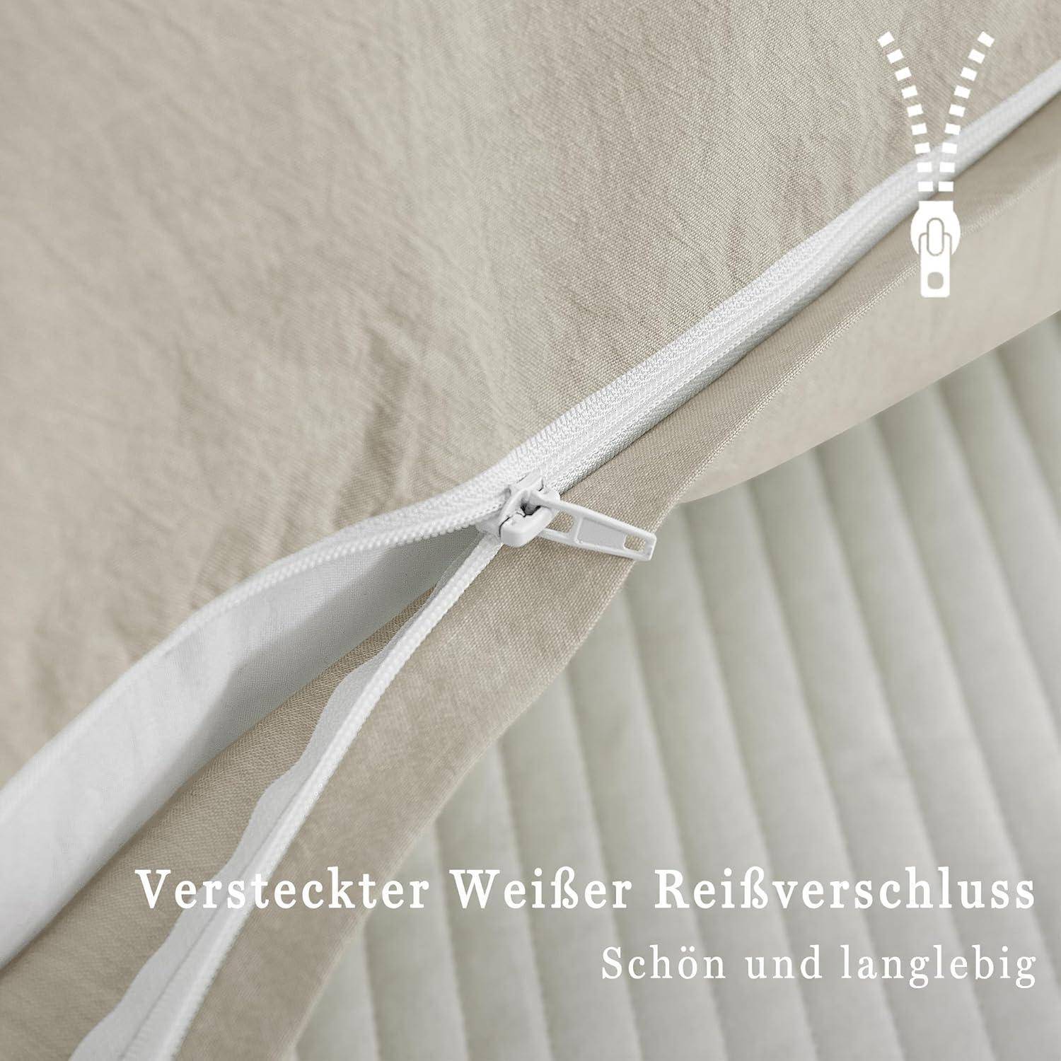 Nahaufnahme von Bettwäschestoff mit einem versteckten weißen Reißverschluss. Deutscher Text lautet 'Versteckter Weißer Reißverschluss' und 'Schön und langlebig'.