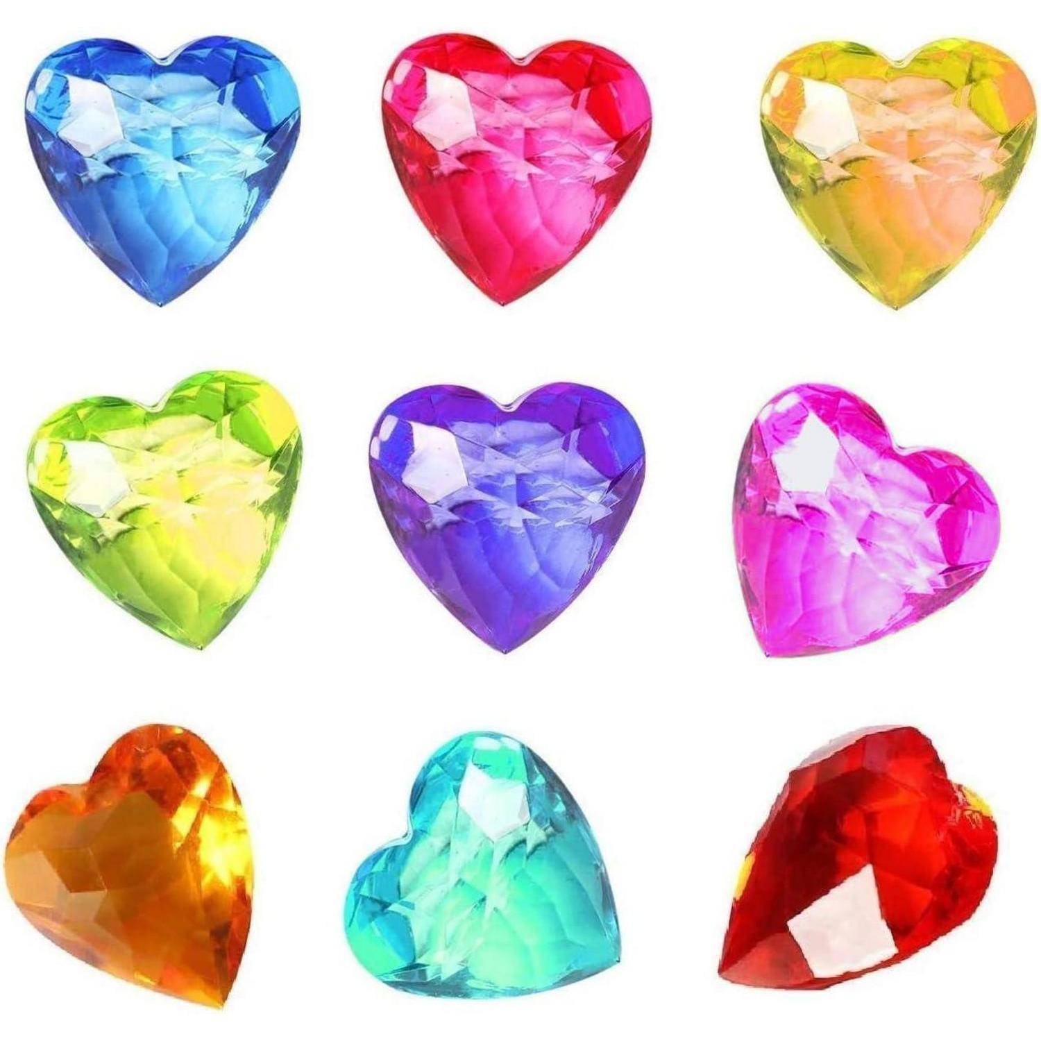 Neun mehrfarbige herzförmige Edelsteine, in einem 3x3-Raster angeordnet, jeder mit einer facettierten Oberfläche und in Farben von Blau, Rot, Grün und mehr variierend.