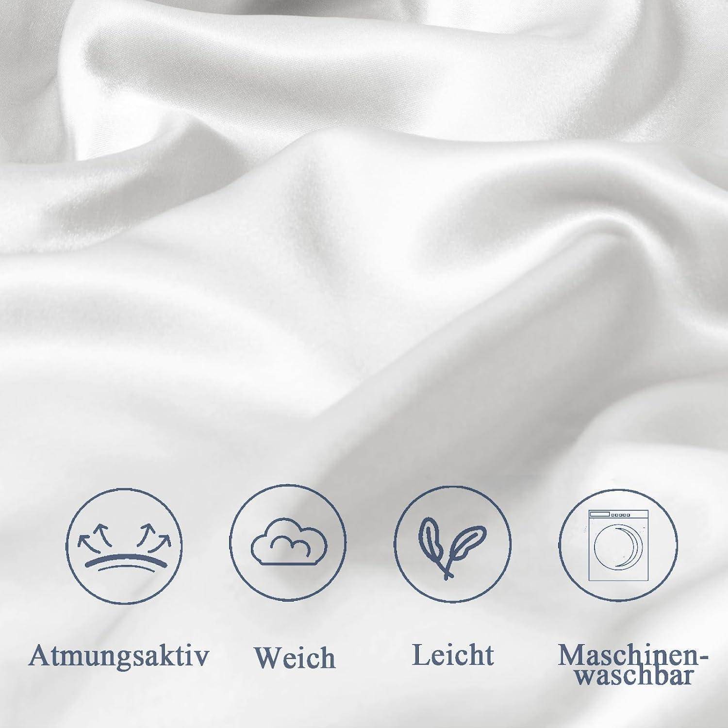 Weißer Stofftextur mit Symbolen und Text darunter. Die Symbole repräsentieren Atmungsaktivität, Weichheit, Leichtigkeit und Maschinenwäsche.