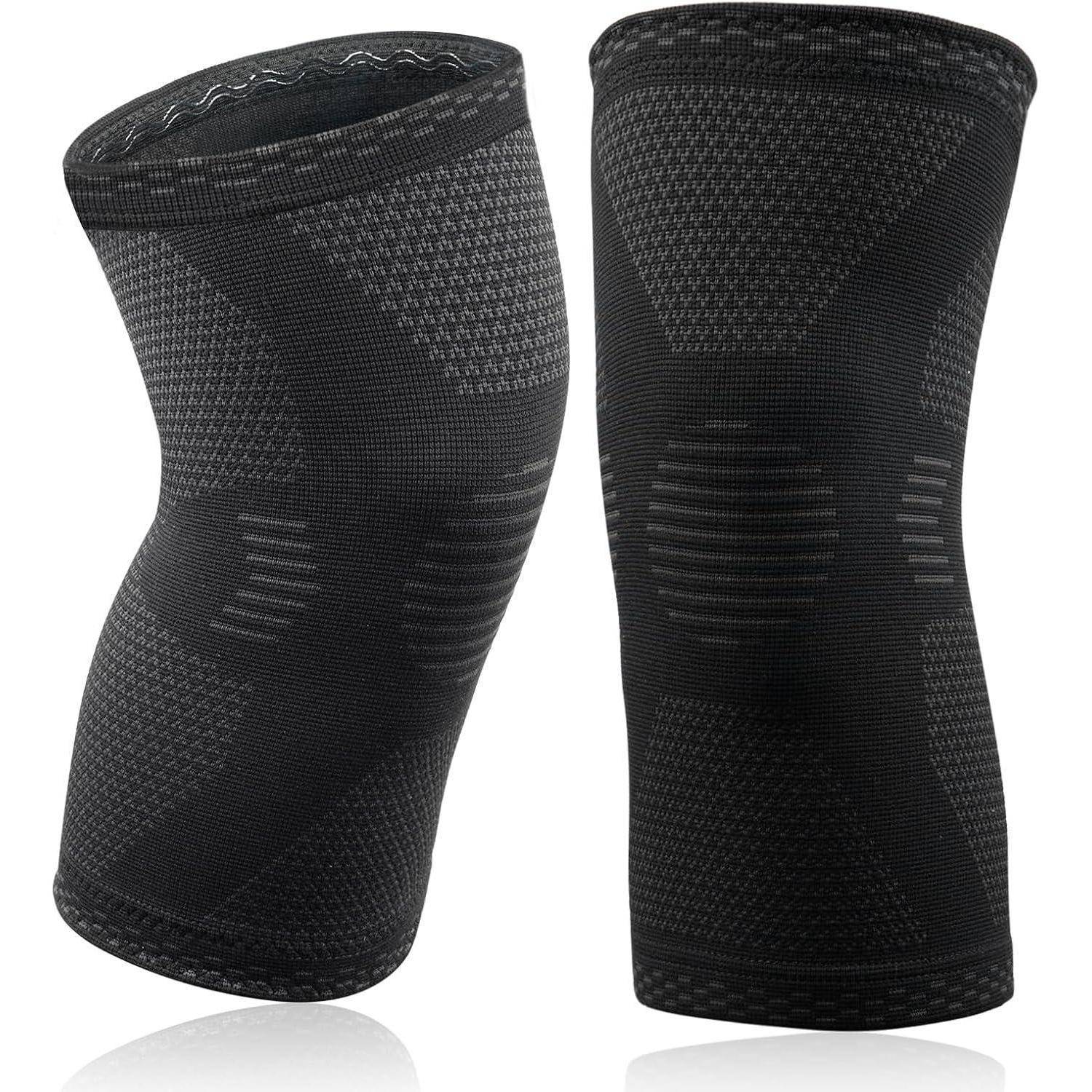 Zwei schwarze Knie-Kompressionshüllen mit strukturiertem Design, die Unterstützung und Stabilität bieten. Geeignet für Sport und Linderung von Gelenkschmerzen.