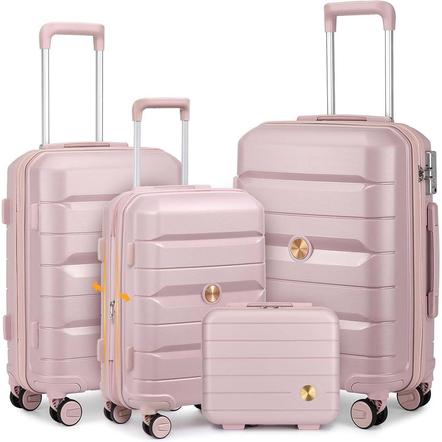 Ein Set aus vier rosa Koffern in unterschiedlichen Größen, jeder mit ausziehbarem Teleskopgriff und Doppelrollen-Laufrollen, nebeneinander angeordnet.