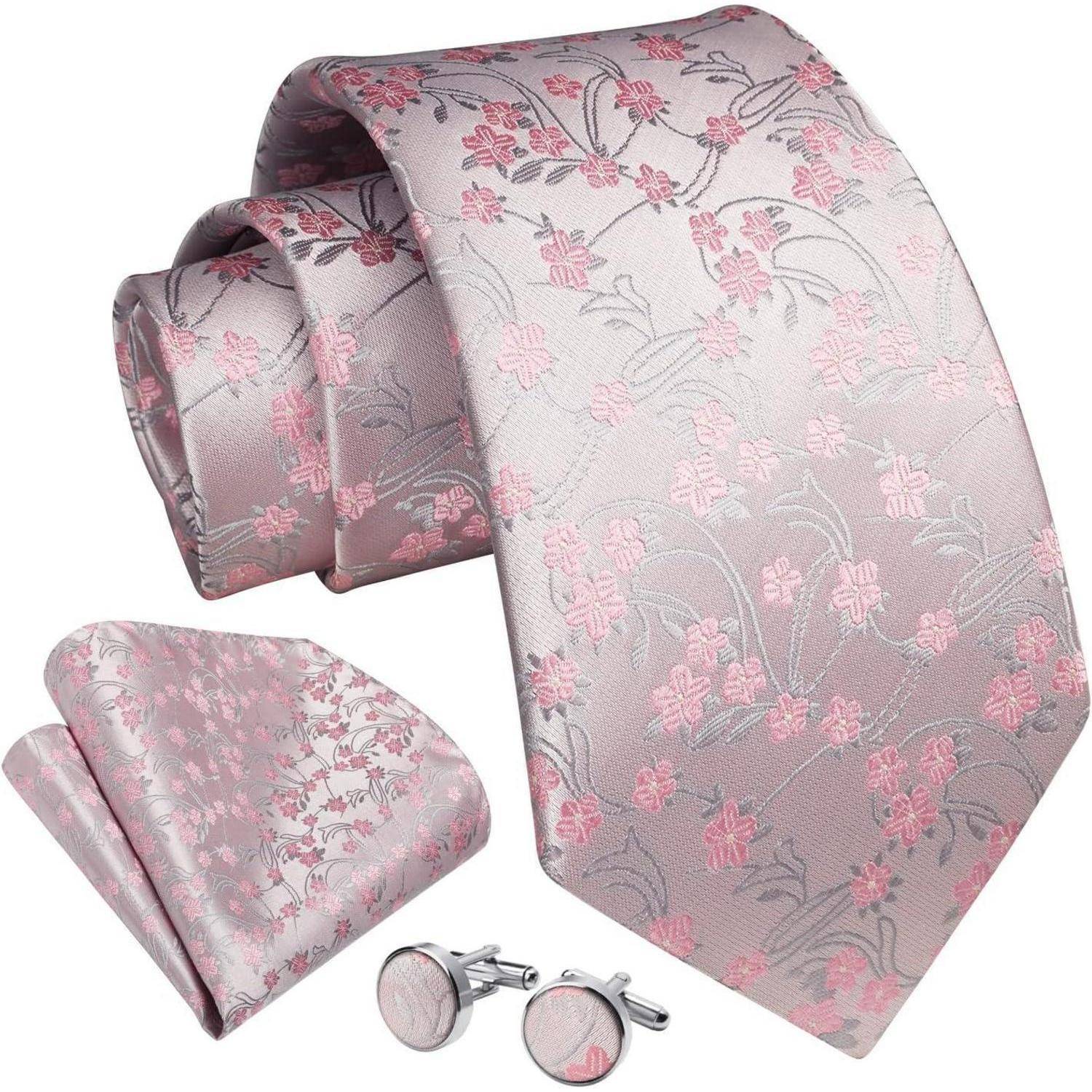 Ein Set von Herren-Accessoires: Eine rosa Krawatte mit Blumenmuster, passendes Einstecktuch und Manschettenknöpfe, elegant auf einem schlichten Hintergrund angeordnet.