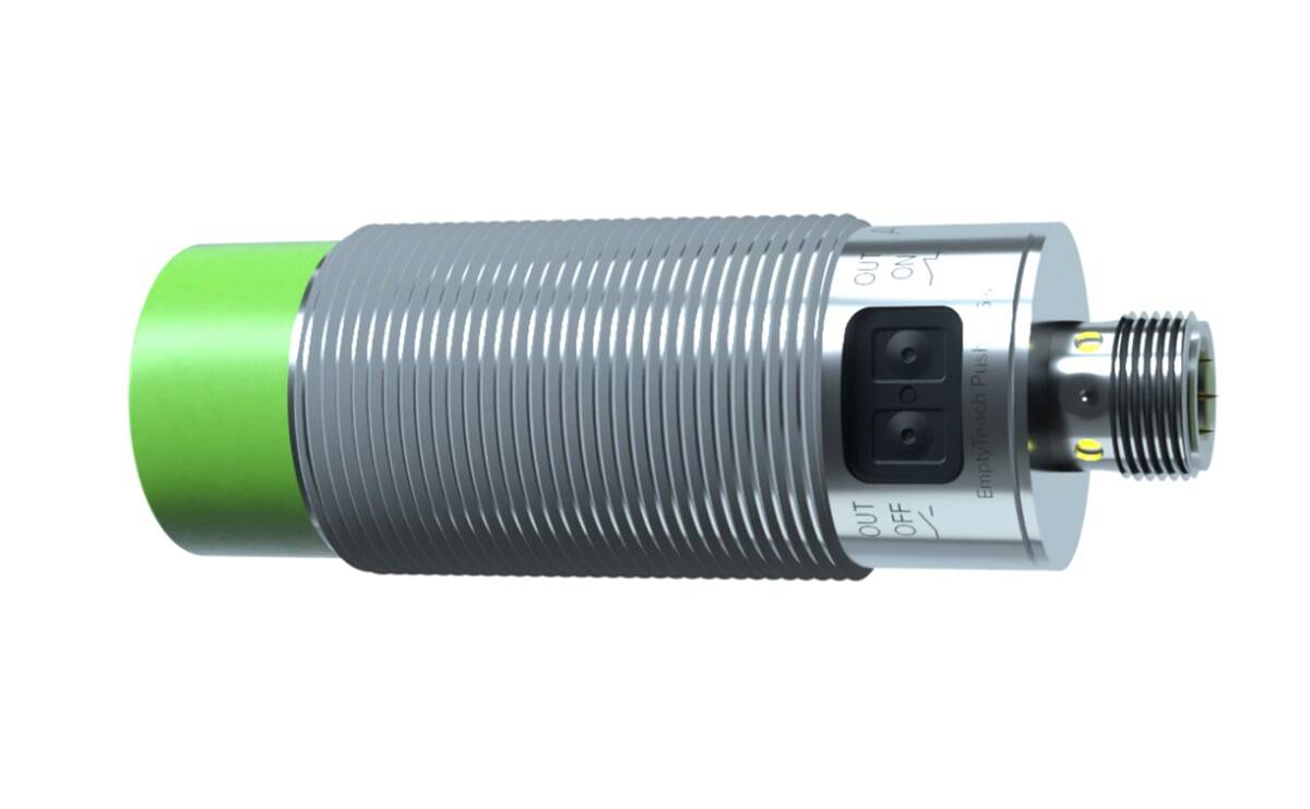 Nahaufnahme eines metallischen zylindrischen Sensors mit gerippter Oberfläche und zwei Tasten, die mit 'OUT' und 'OFF' beschriftet sind.