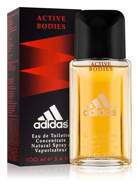 Adidas Active Bodies Eau de Toilette Flasche und Schachtel, schwarze und bernsteinfarbene Verpackung mit "adidas""-Branding und gezeigter Größe von 100 ml.