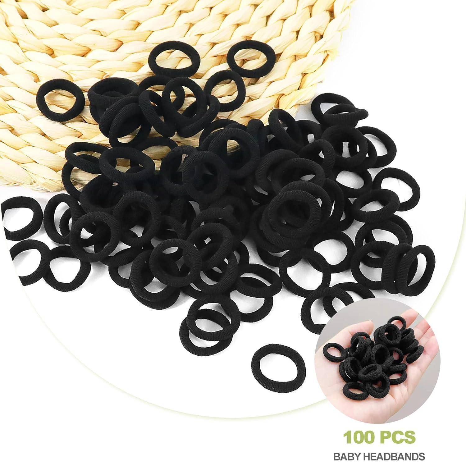 Schwarze Babyhaarreifen sind auf einer geflochtenen Matte verstreut. Ein kleineres Bild zeigt eine Handvoll Haarreifen. Der Text lautet „100 STK. BABY-HAARREIFEN