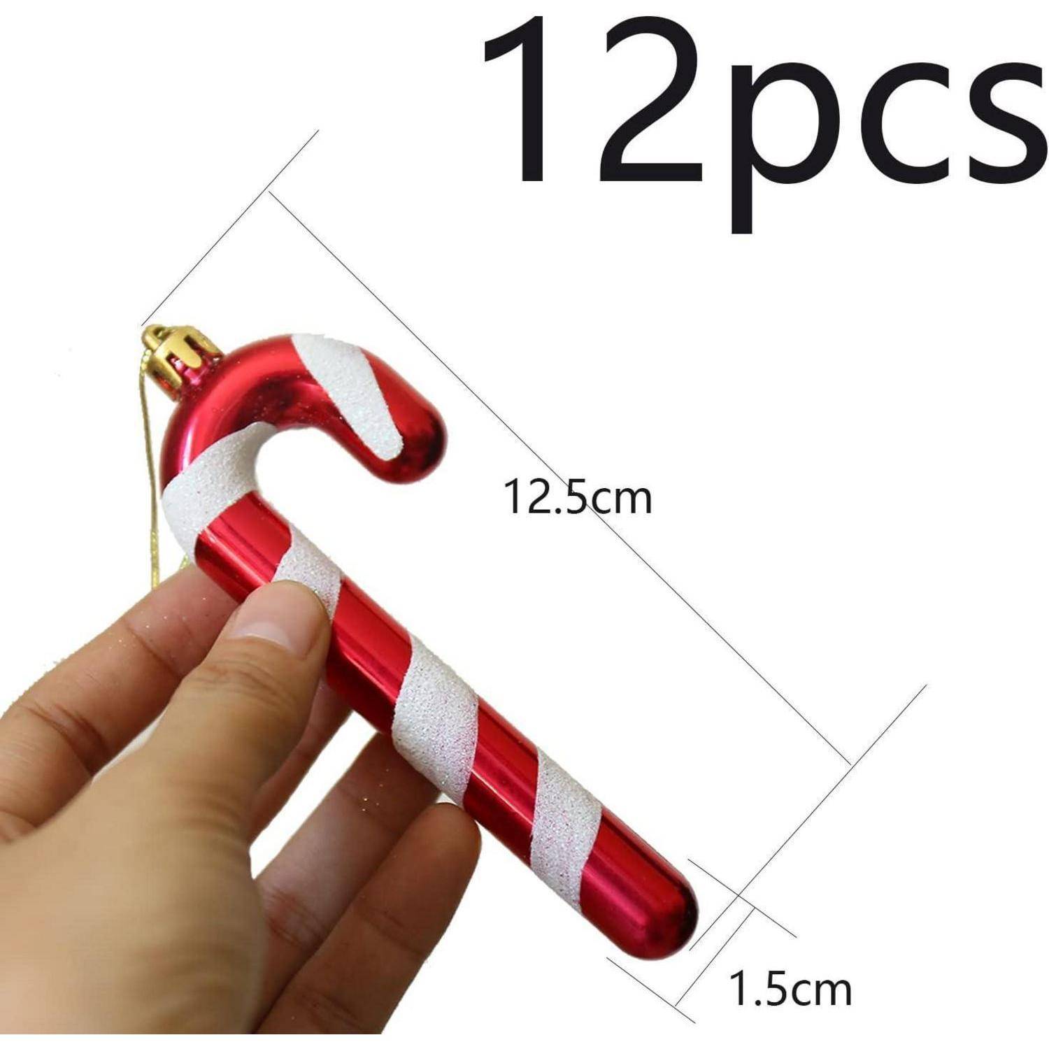 Hand hält einen rot-weiß gestreiften Zuckerstangen-Anhänger. Text zeigt '12 Stück', mit Maßen: 12,5 cm Länge und 1,5 cm Breite.
