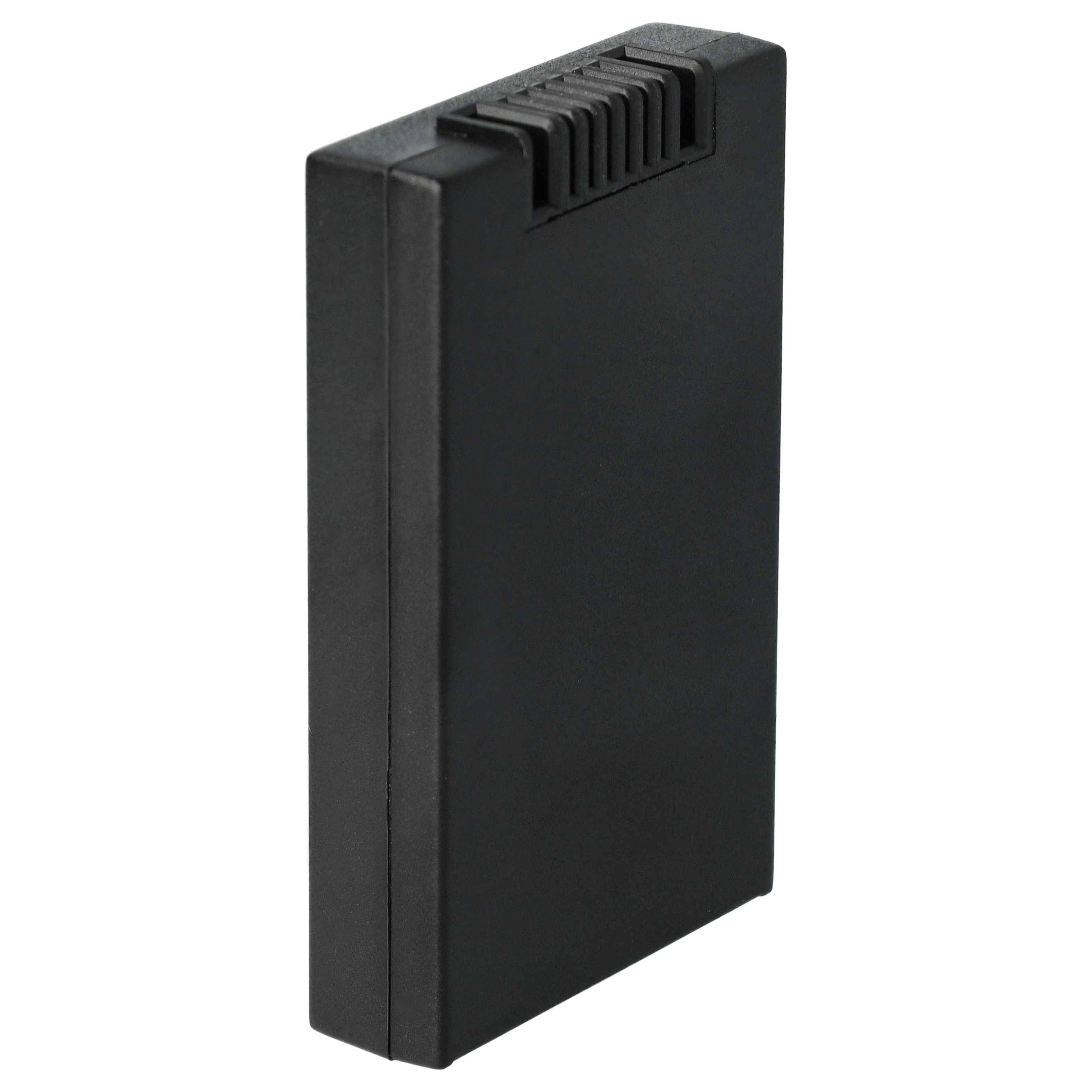 Eine schwarze rechteckige Laptop-Batterie mit einer gerillten Oberkante, die aufrecht steht.