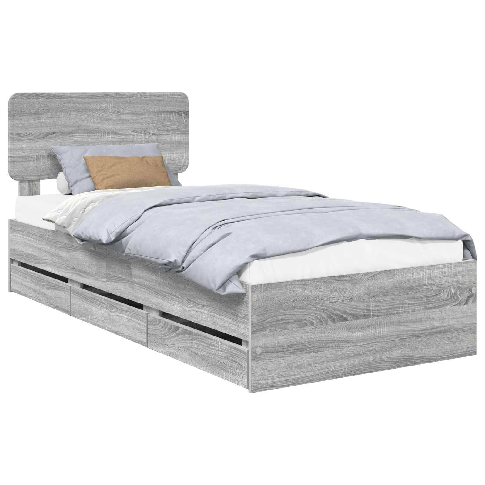 Ein grauer Holzplattformbett mit Kopfteil, ausgestattet mit hellblauer Bettwäsche und einem beigen Kissen, mit drei Aufbewahrungsschubladen darunter.