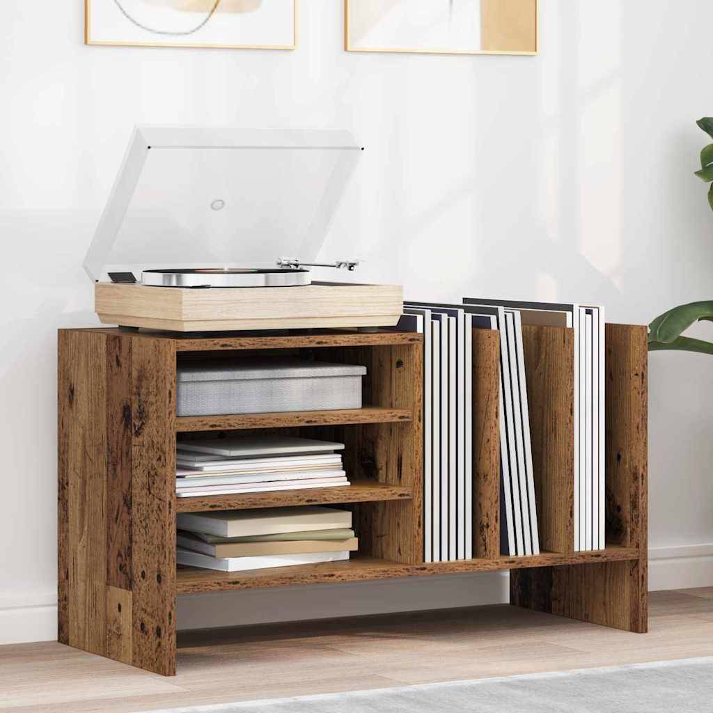 Ein Plattenspieler-Ständer aus Holz mit vertikal gelagerten Schallplatten auf der rechten Seite und Regalen mit Büchern und Accessoires auf der linken Seite.