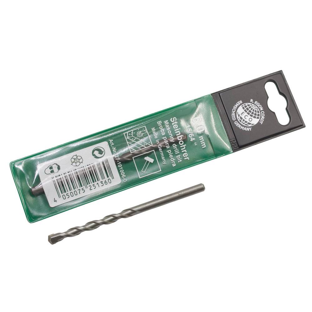 Ein 6-mm-Metallbohrer neben seiner grünen Verpackung, auf der eine Etikette mit der Aufschrift 