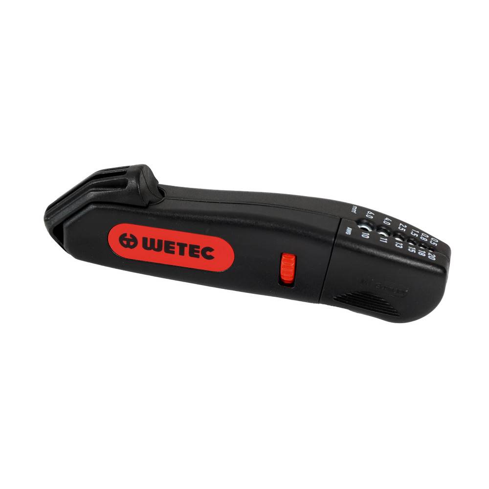 Ein schwarzes und rotes Handgerät mit der Aufschrift 'WETEC' und einer Tastatur an der Seite, ausgestattet mit einem Schiebemechanismus.