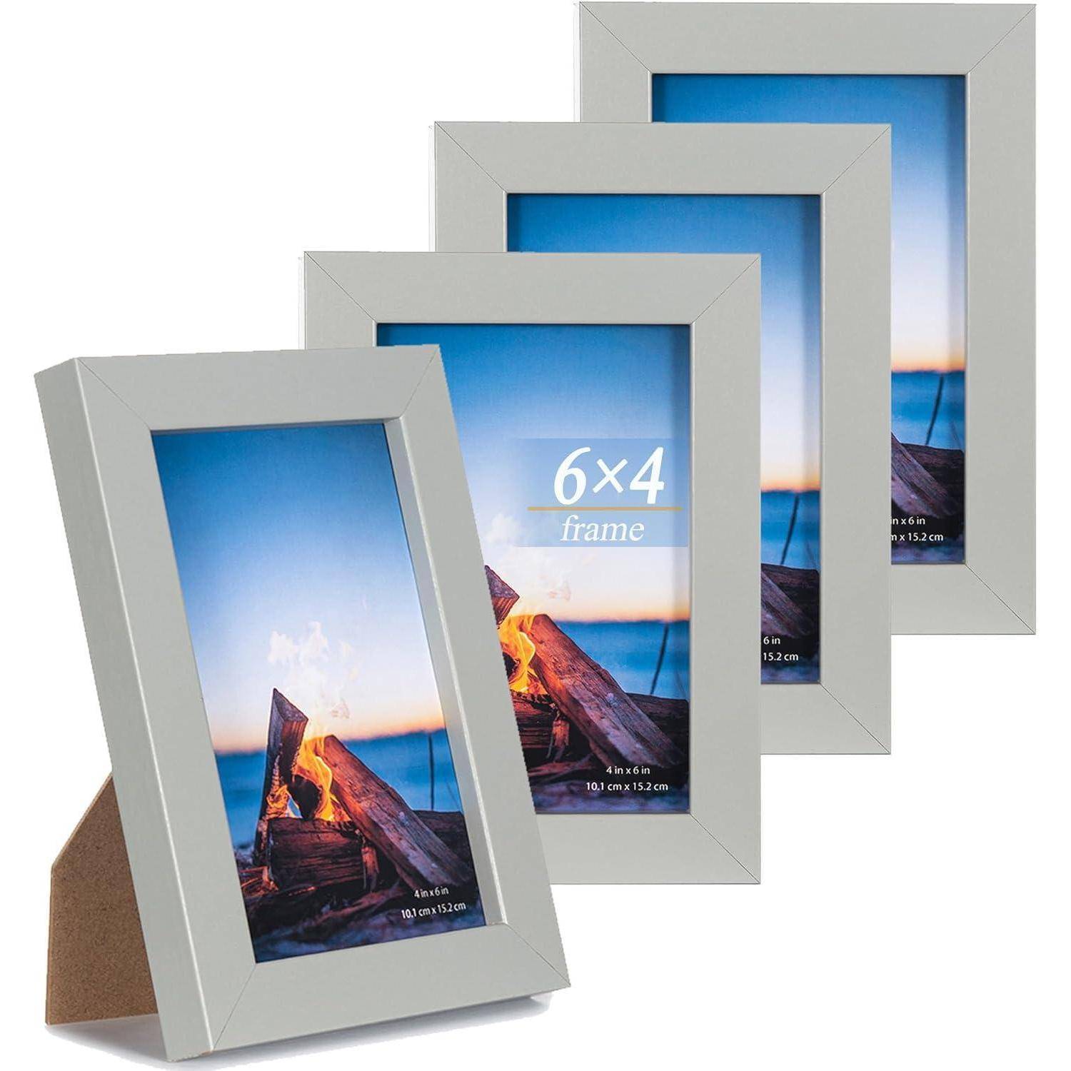 Vier graue Bilderrahmen, die jeweils ein Foto eines Strandfeuers zeigen und mit 6x4 Zoll (15 x 10 cm) beschriftet sind.