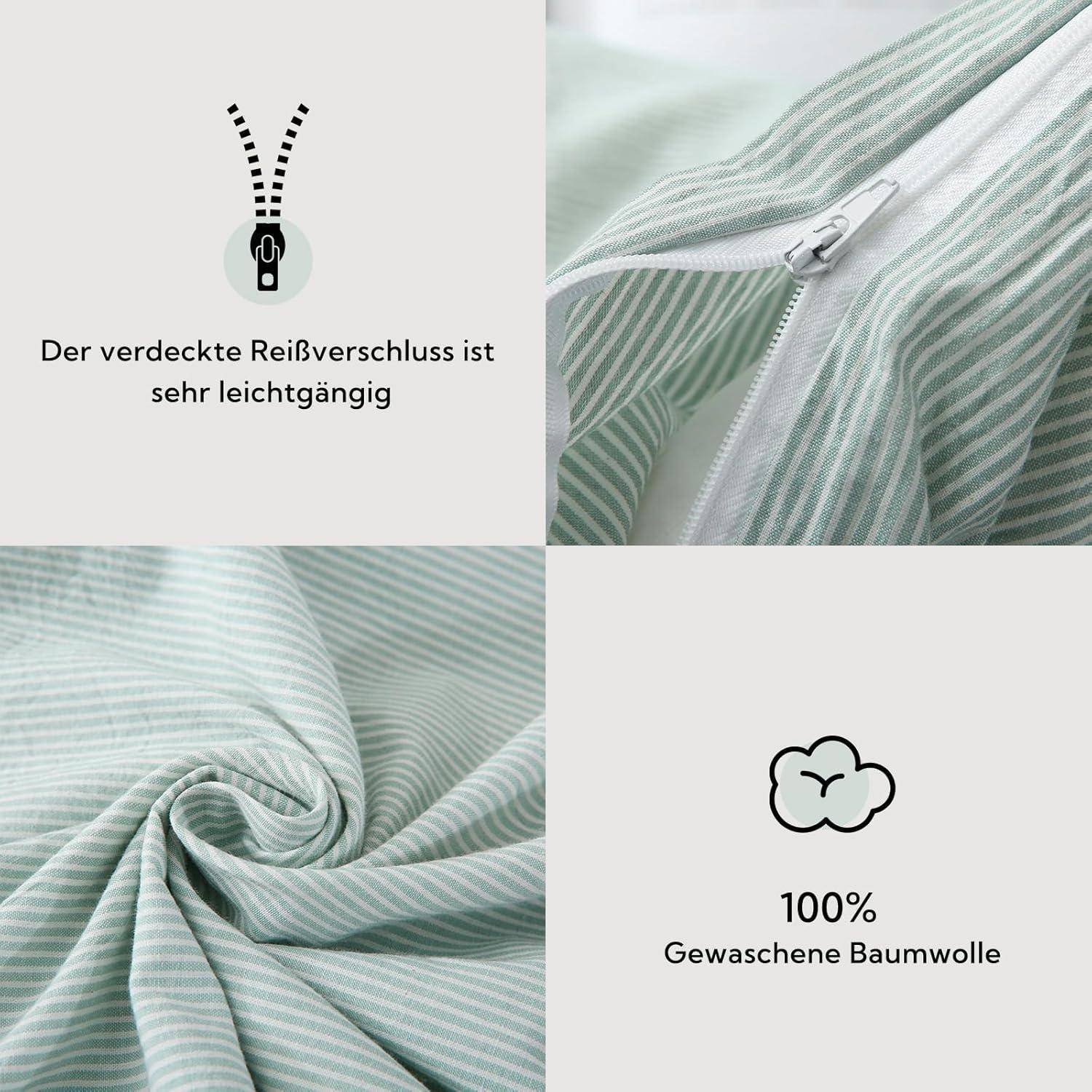 Das Bild zeigt einen grün-weiß gestreiften Stoff mit einem verdeckten Reißverschluss. Text liest sich: 'Der verdeckte Reißverschluss ist sehr leichtgängig' und '100% Gewaschene Baumwolle'.