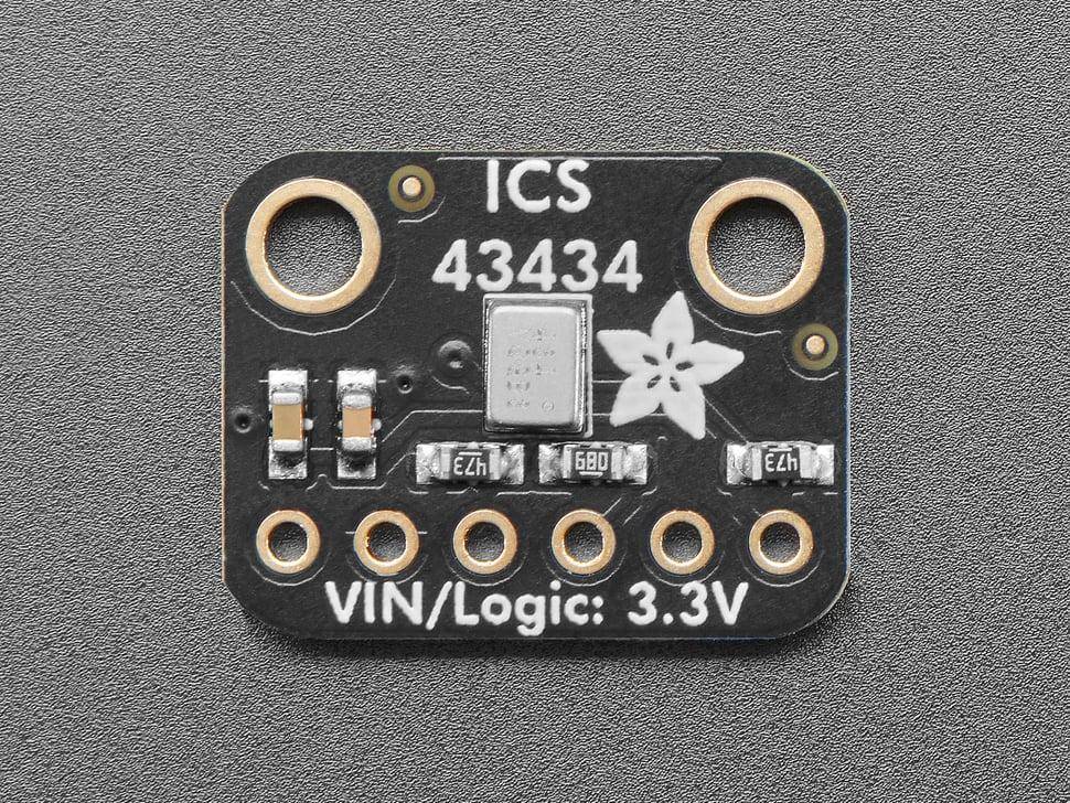 Sensormodul 'ICS 43434' mit Anschlüssen, die mit 'VIN/Logic: 3.3V' beschriftet sind, ausgestattet mit zwei Befestigungslöchern und elektronischen Komponenten.