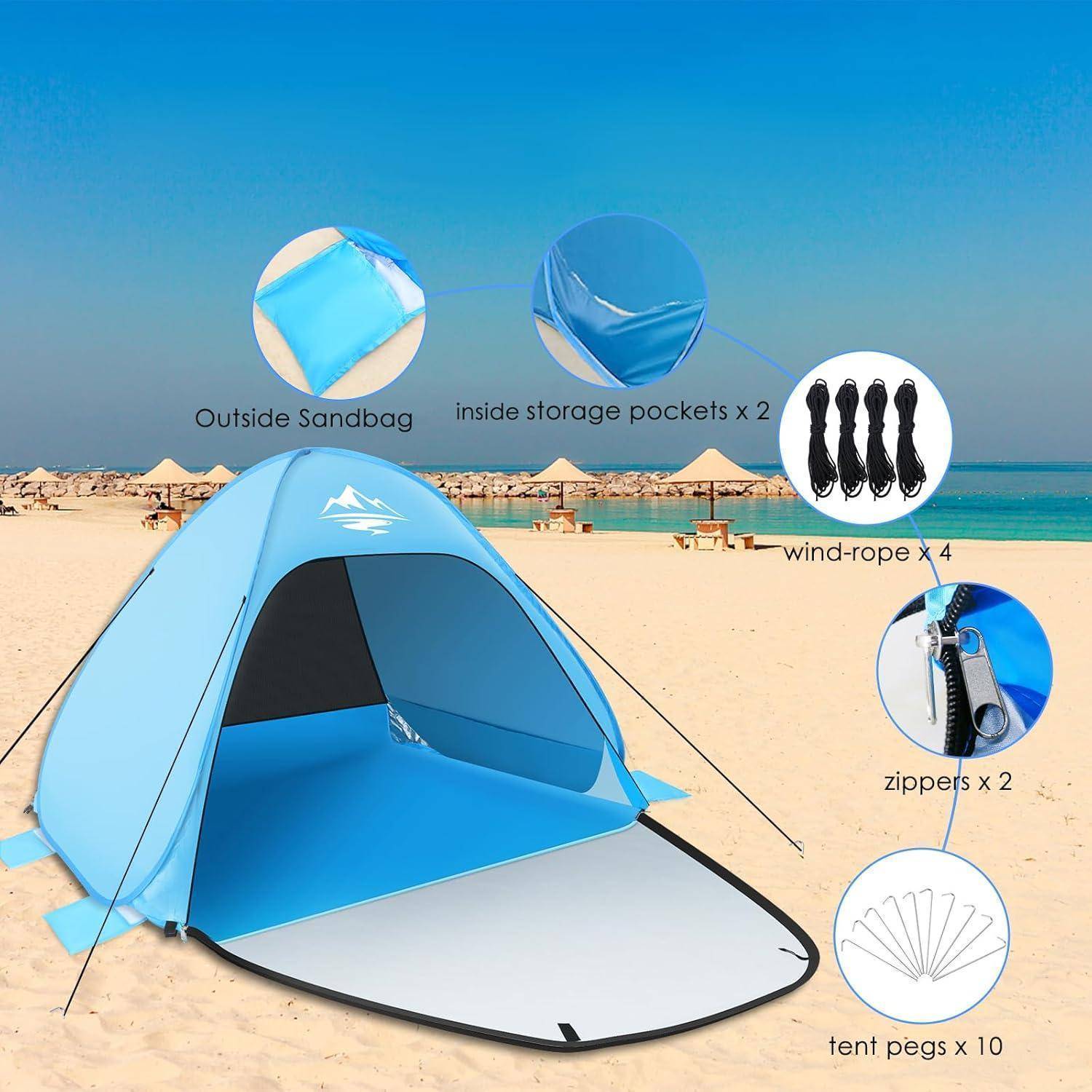 Blaues Strand-Zelt mit Sandsack, Aufbewahrungstaschen, vier Windseilen, zwei Reißverschlüssen und zehn Heringe, das an einem sonnigen Strand ausgestellt ist.