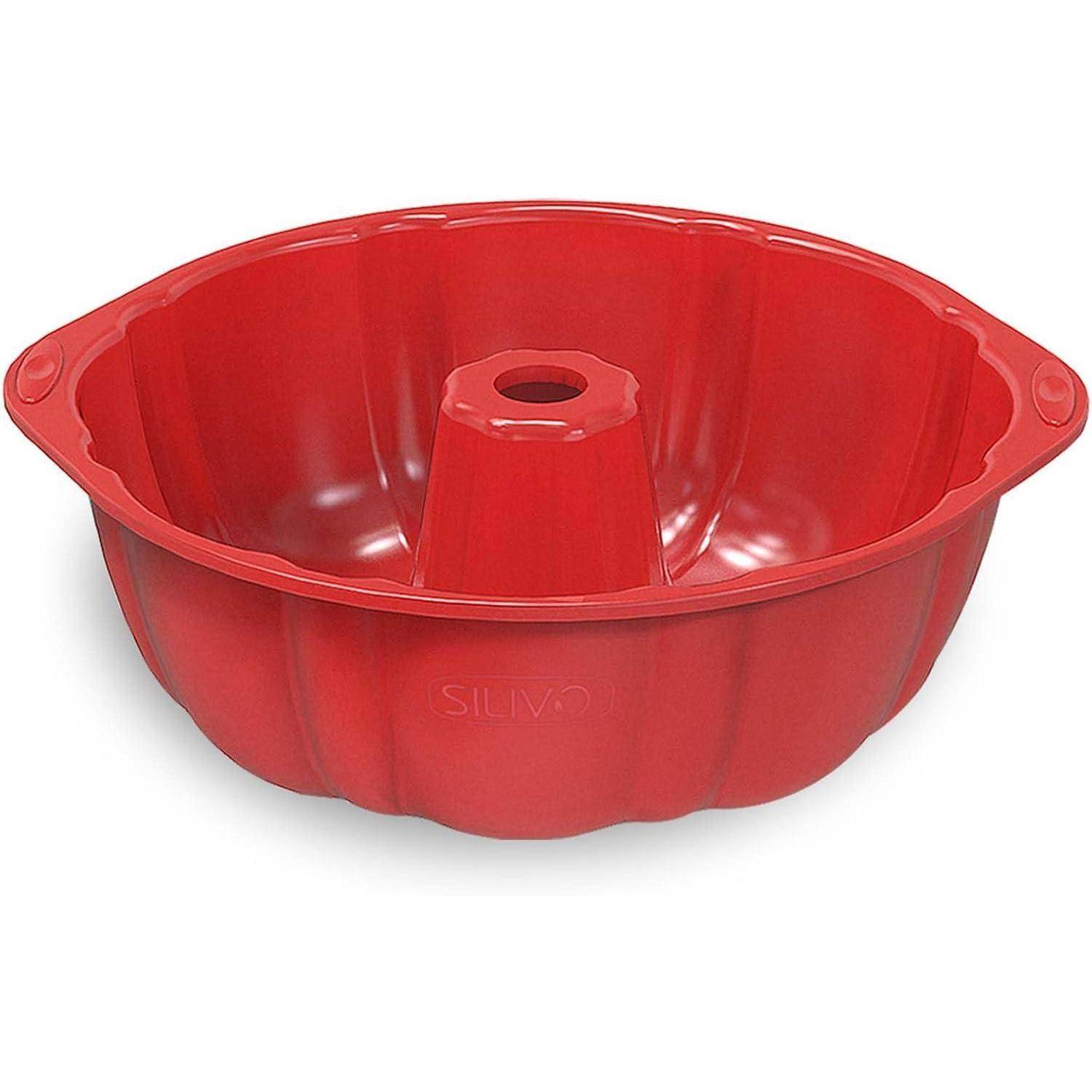 Eine rote Silikonkuchenform mit Rohransatz in Bundt-Form mit glatter, gerillter Oberfläche und zentralem Rohr für gleichmäßiges Backen. Ideal zum Zubereiten von ringförmigen Kuchen.