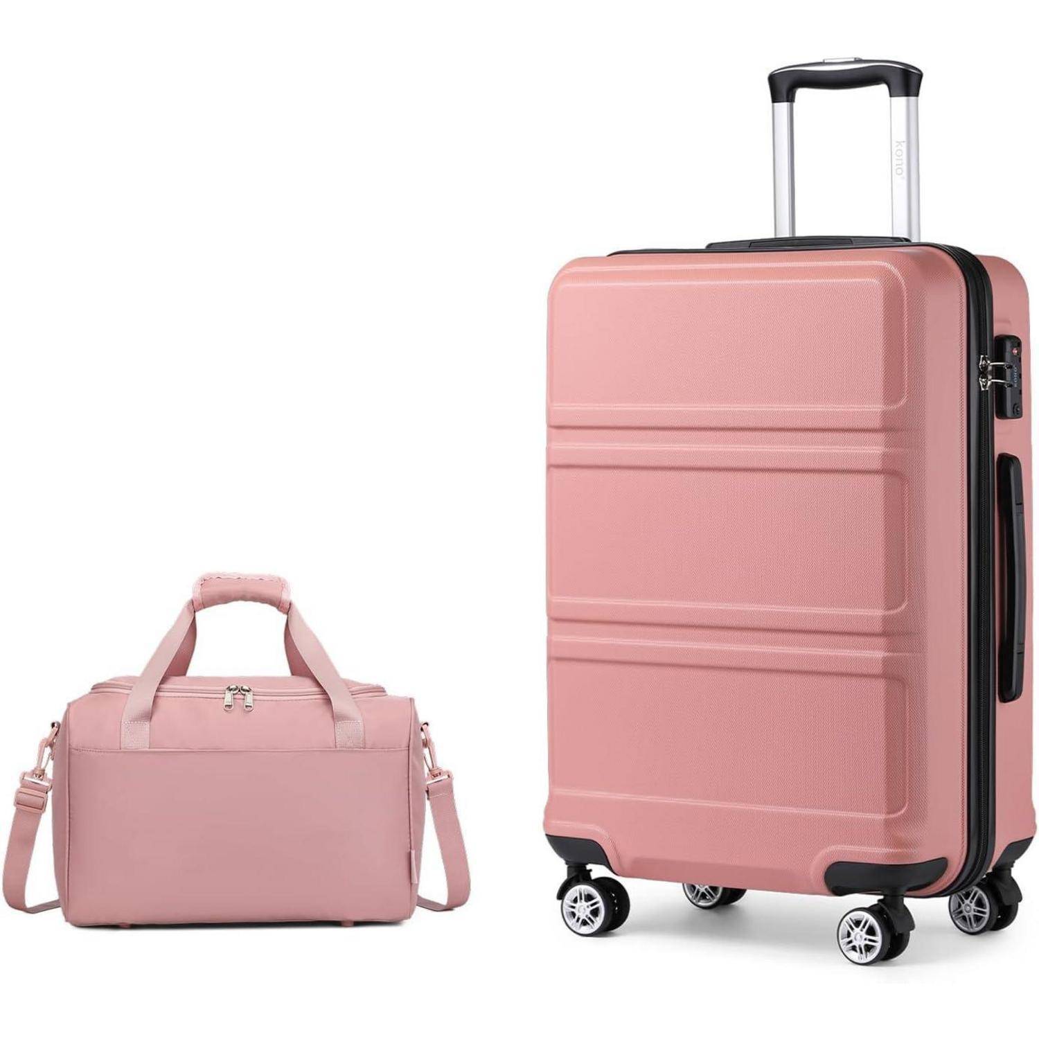 Ein großer pinkfarbener Koffer mit einem Seitengriff und Rollen steht neben einer passenden pinkfarbenen Reisetasche mit Schultergurt.