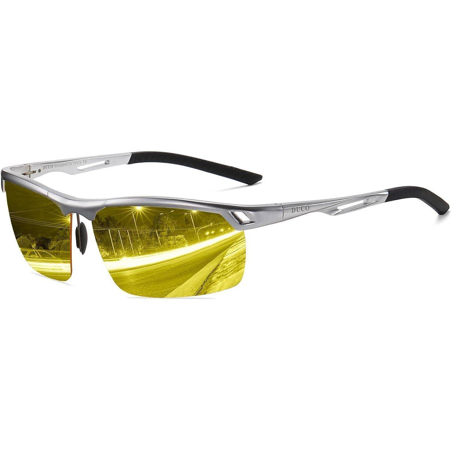 Sport-Sonnenbrille mit silbernen Rahmen und gelb getönten Gläsern. Die Gläser spiegeln eine nächtliche Straßenszene wider und unterstreichen die Verwendung der Brille für das Fahren bei Nacht.