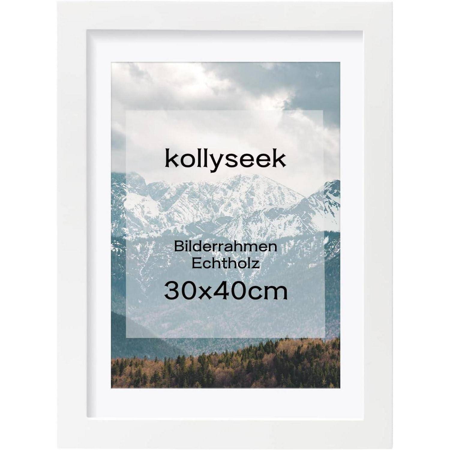 Bilderrahmen mit weißem Rand, der eine malerische Berglandschaft zeigt. Text lautet: 'kollyseek Bilderrahmen Echtholz 30x40cm'.