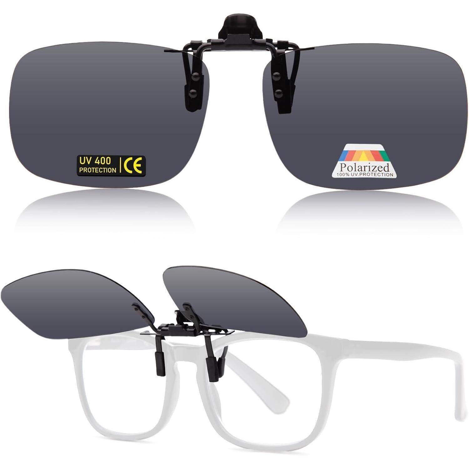 Ansteck-Sonnengläser mit Polarisationsfilter und UV 400 Schutz, die an einer durchsichtigen Brille angebracht und hochgeklappt sind.