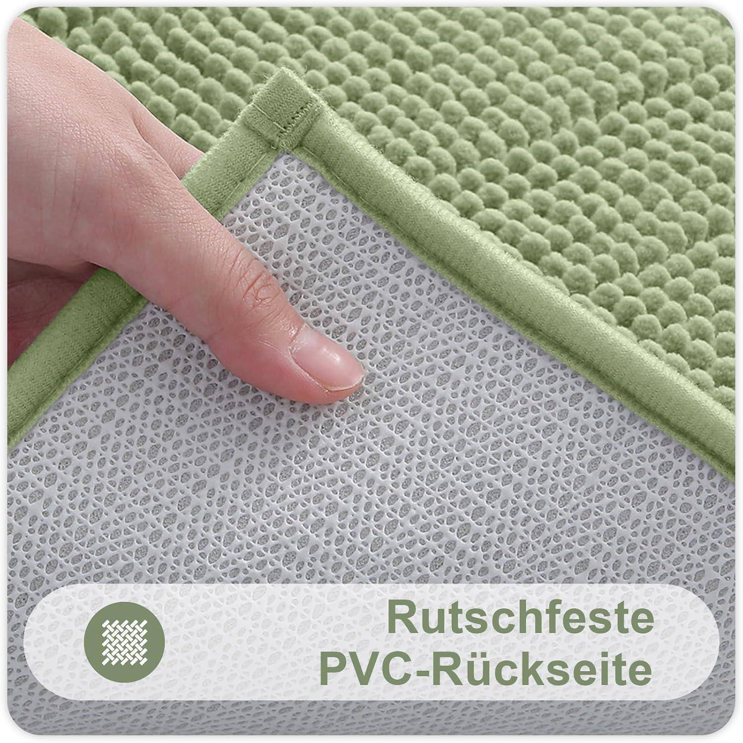 Eine Hand hebt eine grüne, strukturierte Ecke eines Teppichs, um dessen rutschfeste PVC-Rückseite zu zeigen. Deutscher Text lautet: 'Rutschfeste PVC-Rückseite'.