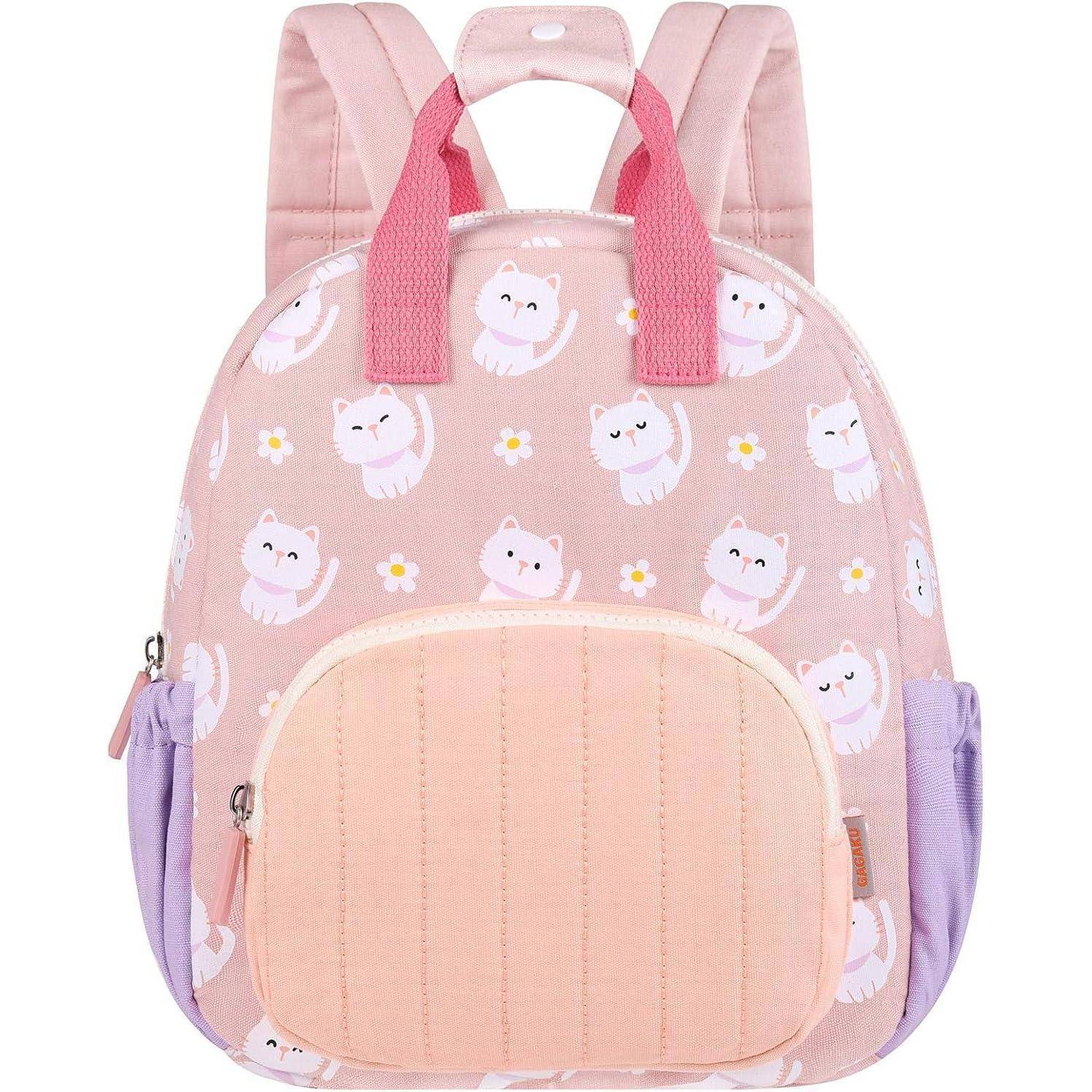 Ein rosa Kinderrucksack mit Cartoon-Katzen und Blumen, mit lila Seitentaschen und einer pfirsichfarbenen Fronttasche.