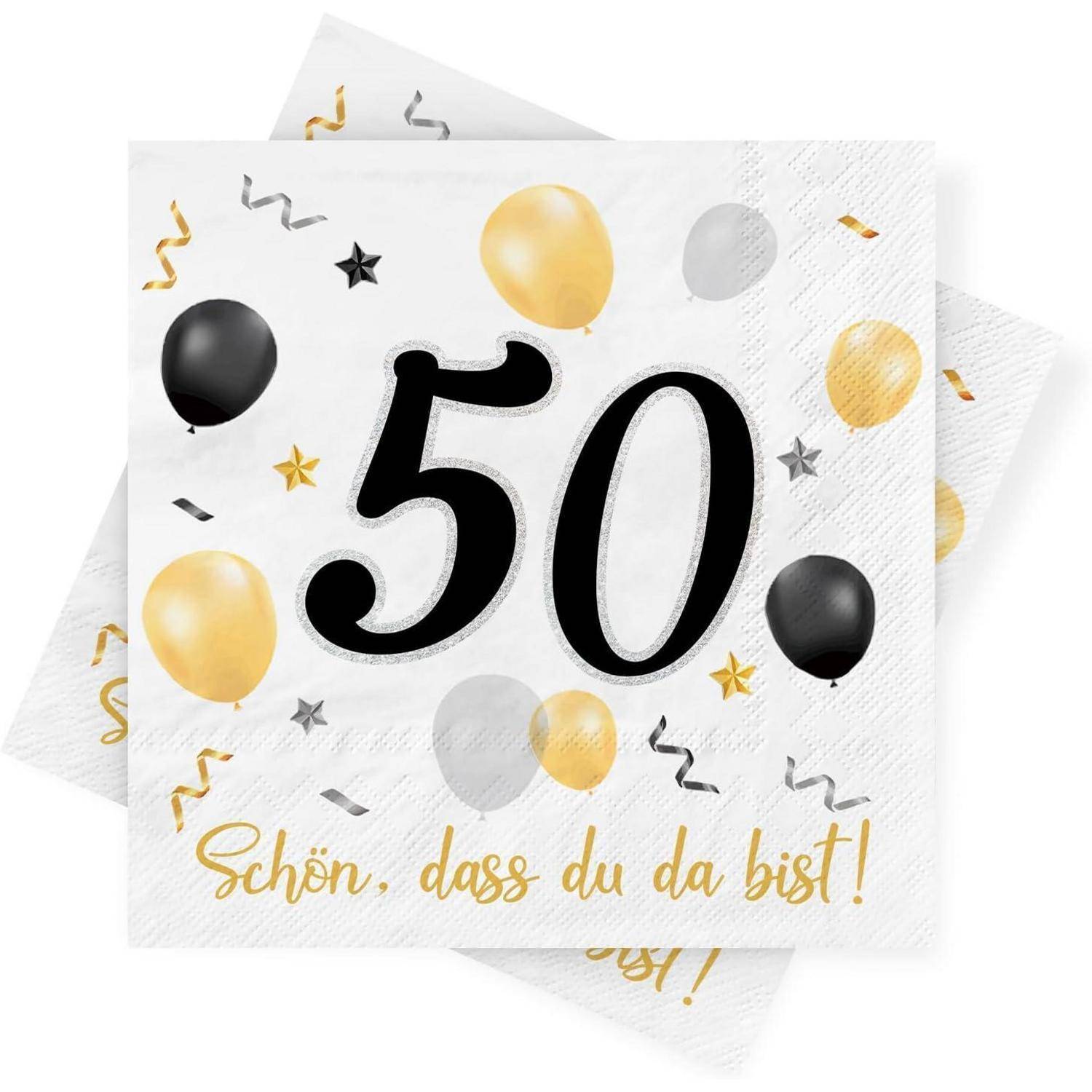 Weißer Serviette mit der Zahl '50', umgeben von schwarzen, goldenen und silbernen Luftballons und Sternen. Darunter steht der Text: 'Schön, dass du da bist!