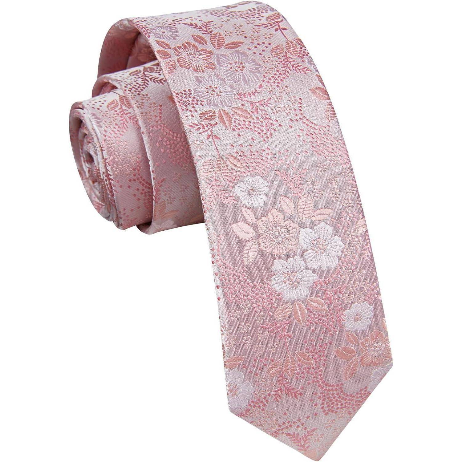 Eine rosa gemusterte Krawatte mit kunstvoll gestalteten hellrosa und weißen Blumen, sorgfältig für die Präsentation aufgerollt.