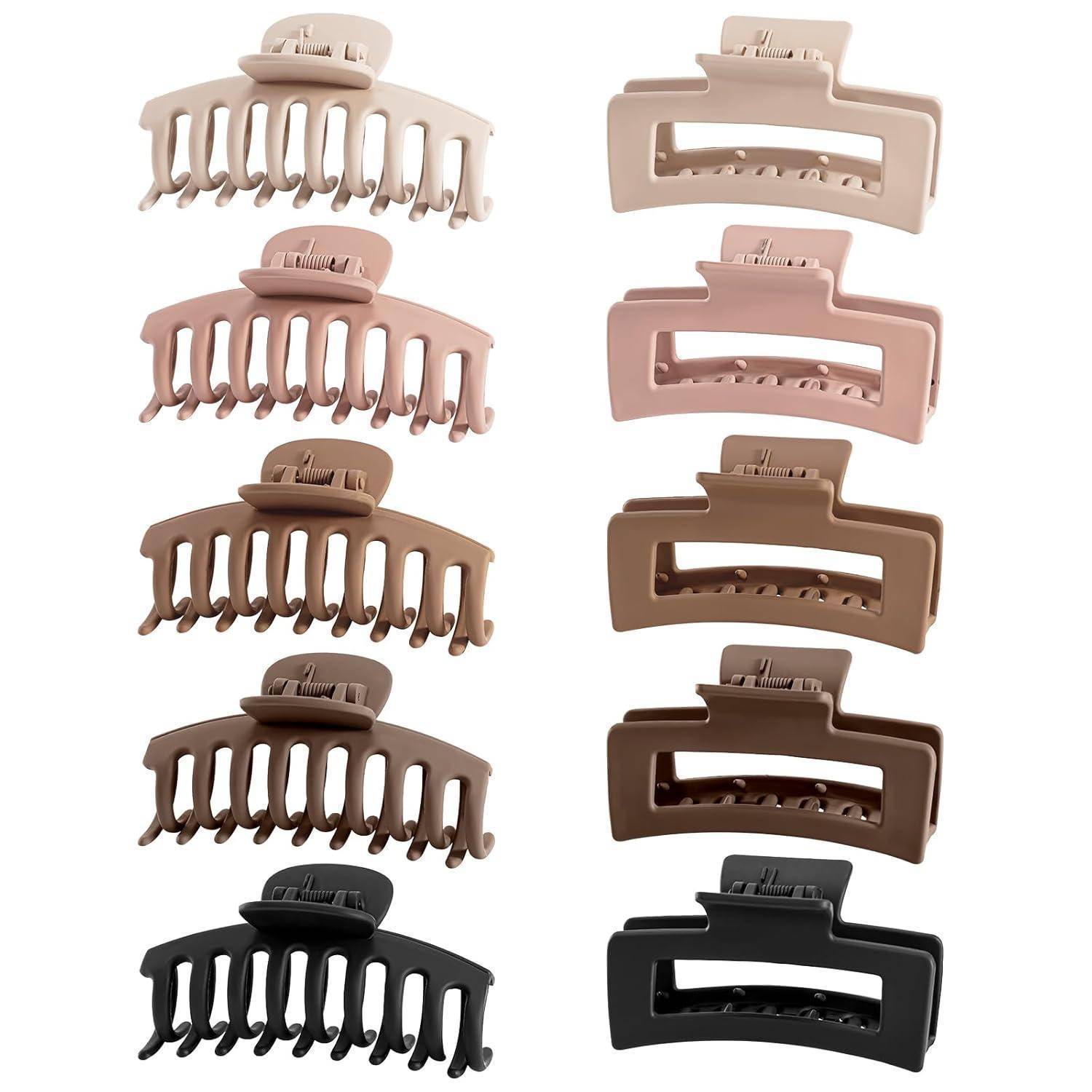 Ein Set von acht großen Haarspangen in verschiedenen neutralen Farben, einschließlich Nuancen von Rosa, Braun und Schwarz, dargestellt in zwei Spalten.