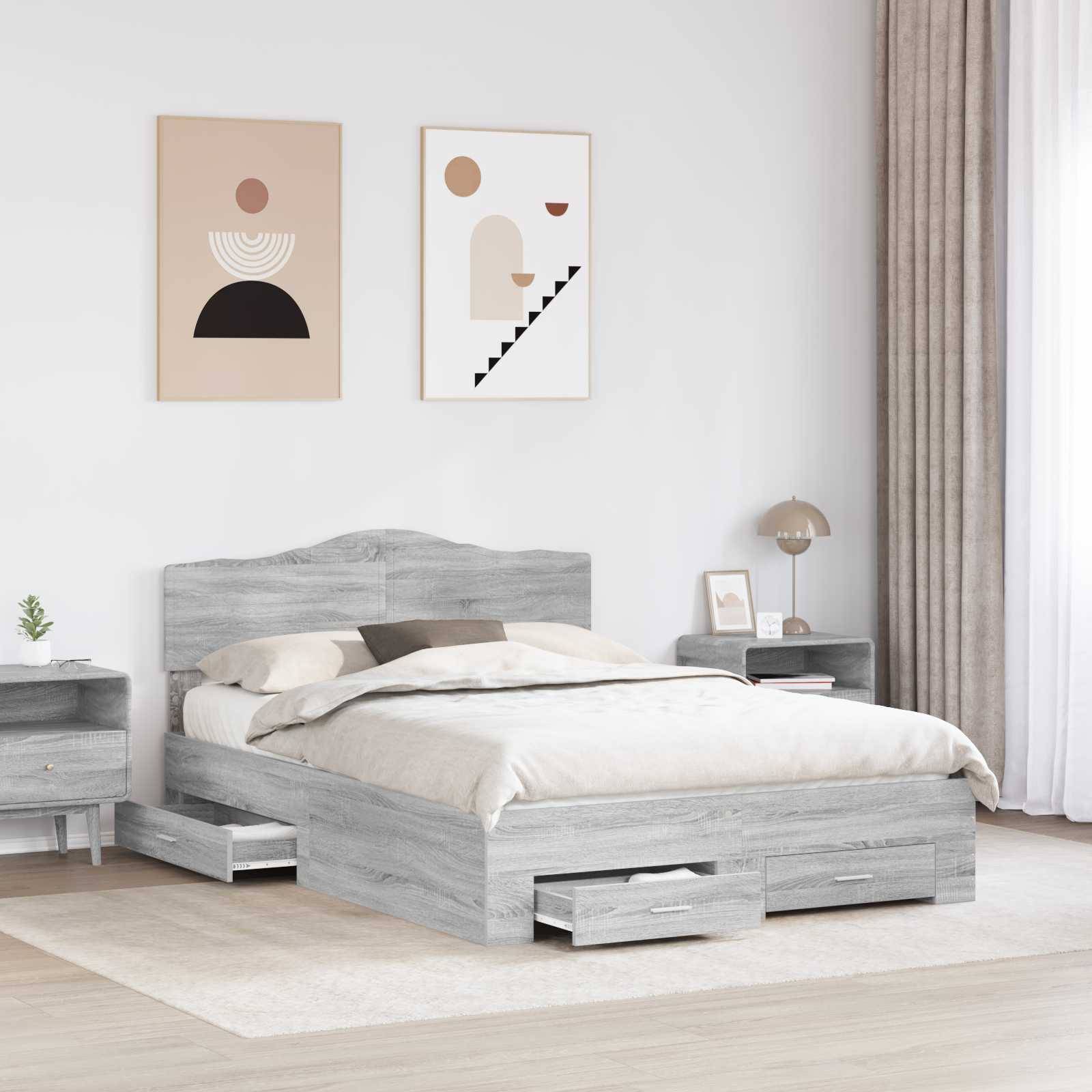 Ein modernes Schlafzimmer zeigt ein hellgraues Holzbett mit Aufbewahrungsschubladen, einen passenden Nachttisch, dekorative Kunstwerke und einen weichen Beige-Teppich.