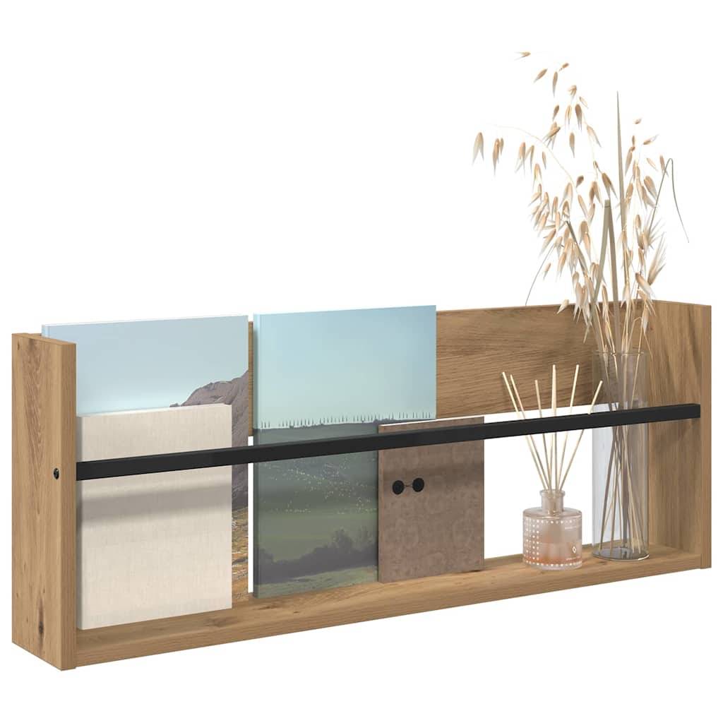 Holzwandregal mit fünf Dekormagazinen und einer Vase mit getrockneten Gräsern, vor einem schlichten weißen Hintergrund.
