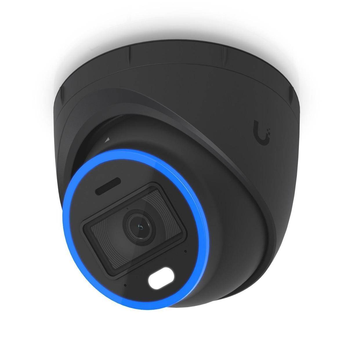 Eine schwarze Kuppelsicherheitskamera, die an einer Decke montiert ist, mit einem leuchtend blauen Ring um das Objektiv, der signalisiert, dass sie eingeschaltet oder aktiv ist.