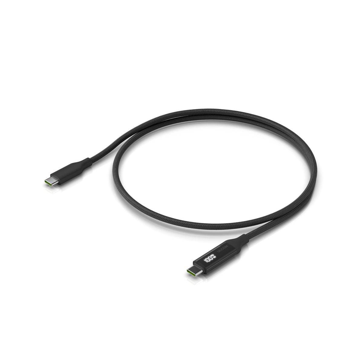 Ein schwarzes USB-C zu USB-C Kabel, aufgewickelt in einer Schleife mit Anschlüssen an beiden Enden.