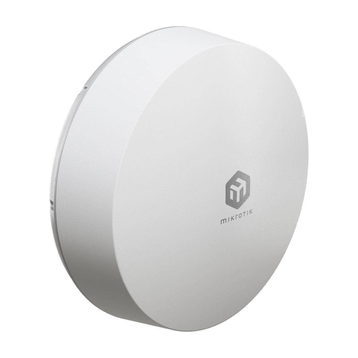 Ein weißes, kreisförmiges Router-Gerät mit der Markenaufschrift 'MikroTik' auf der Vorderseite, das für Internetverbindungen verwendet wird.