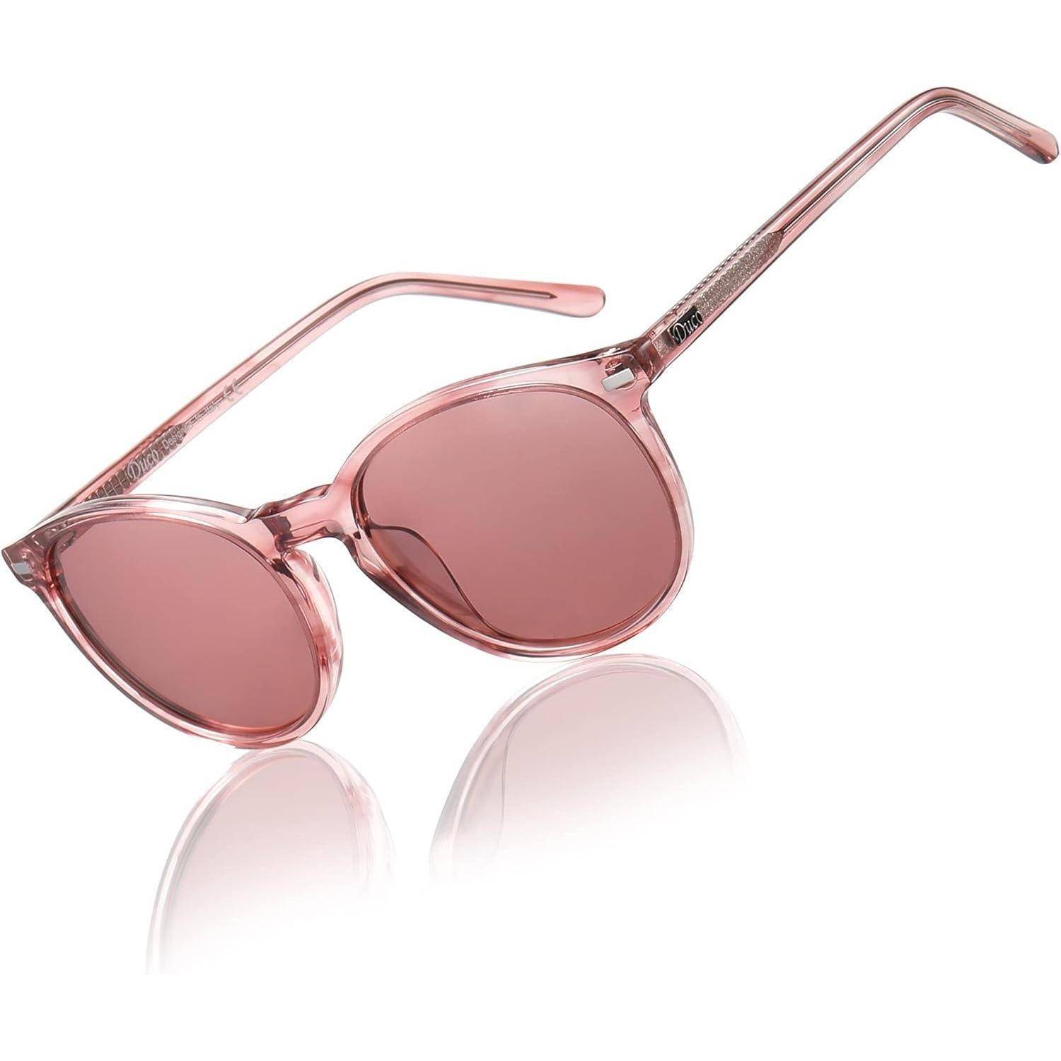 Rosa transparente Sonnenbrille mit runden Gläsern und sanfter Spiegelung darunter.