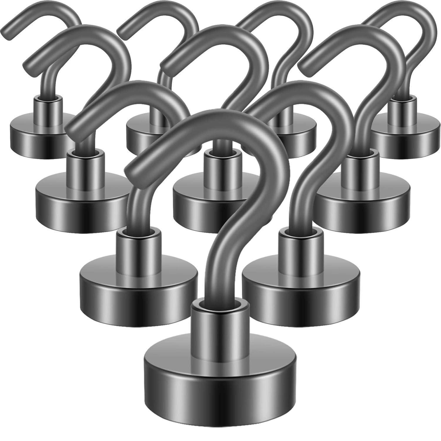 Eine Gruppe von Metallhaken, die an kreisförmigen Basen befestigt und in Reihen angeordnet sind, zur Veranschaulichung eines Konzepts von Verbundenheit oder Befestigung.