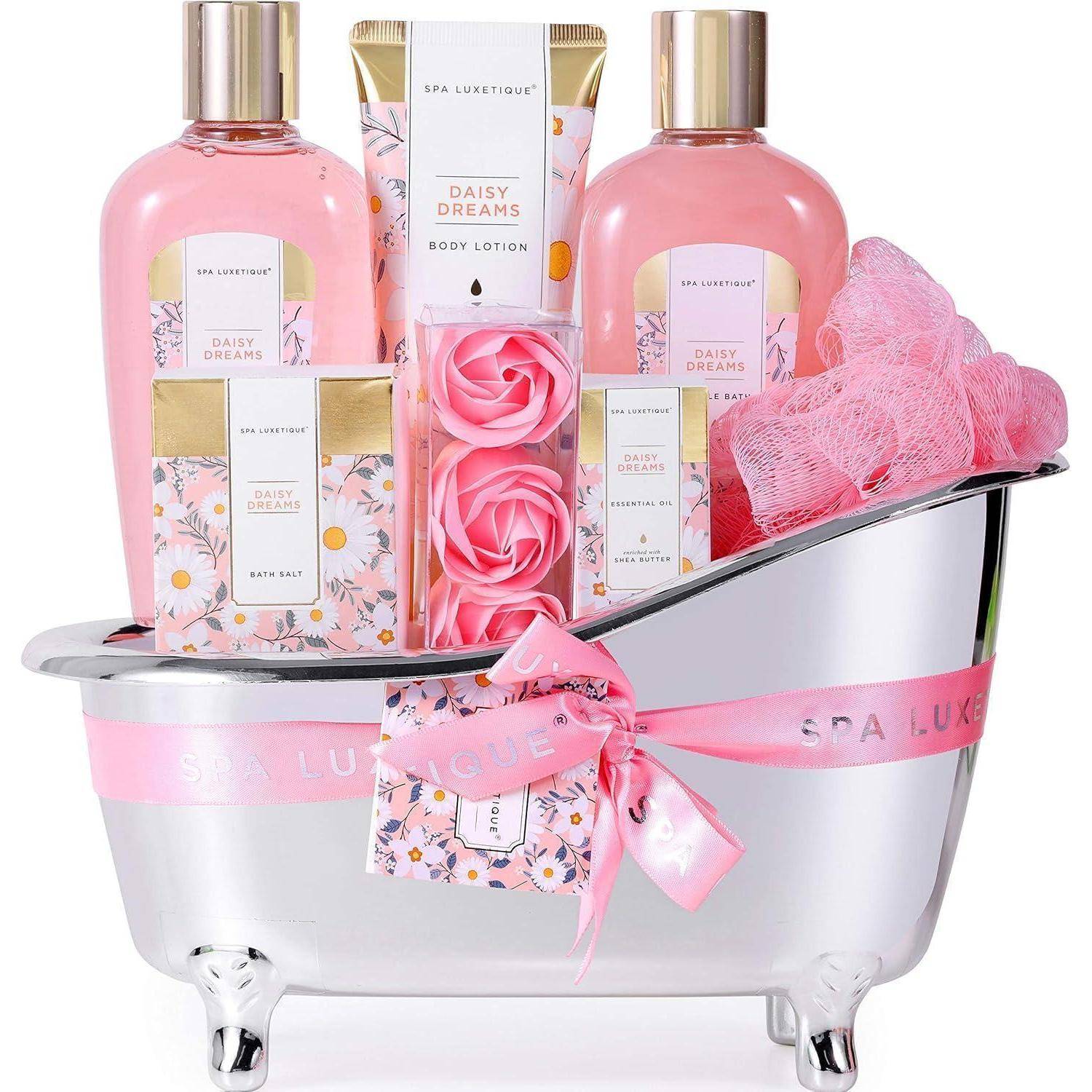 Geschenkset in einer Mini-Badewanne mit Körperlotion, Duschgel, Körperpeeling und Badebombe im Duft 'Daisy Dreams', Rosenseife und Netz-Schwamm.