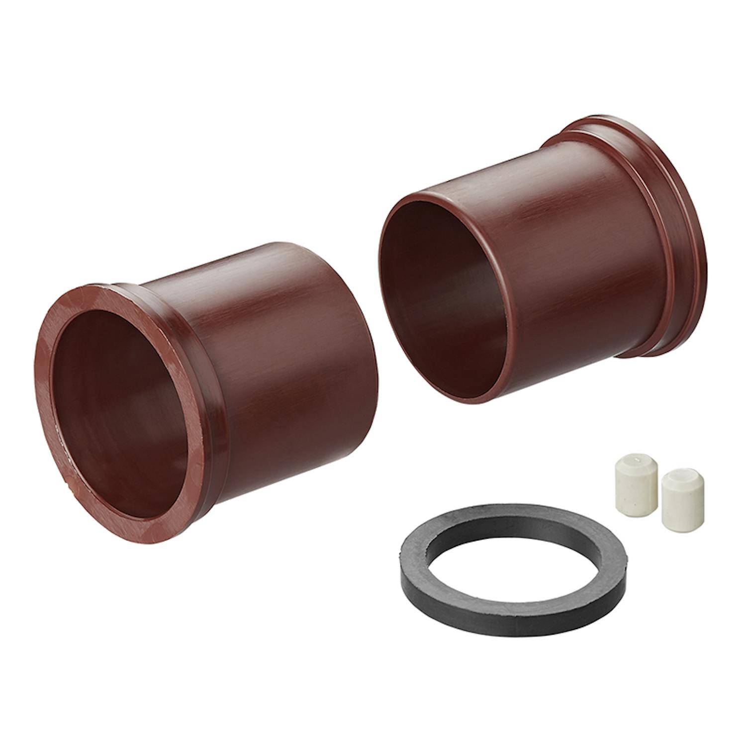 Zwei braune, zylindrische Hülsen mit einem schwarzen Ring und zwei kleinen weißen Zylindern daneben, möglicherweise Teile für Montage oder Reparatur.