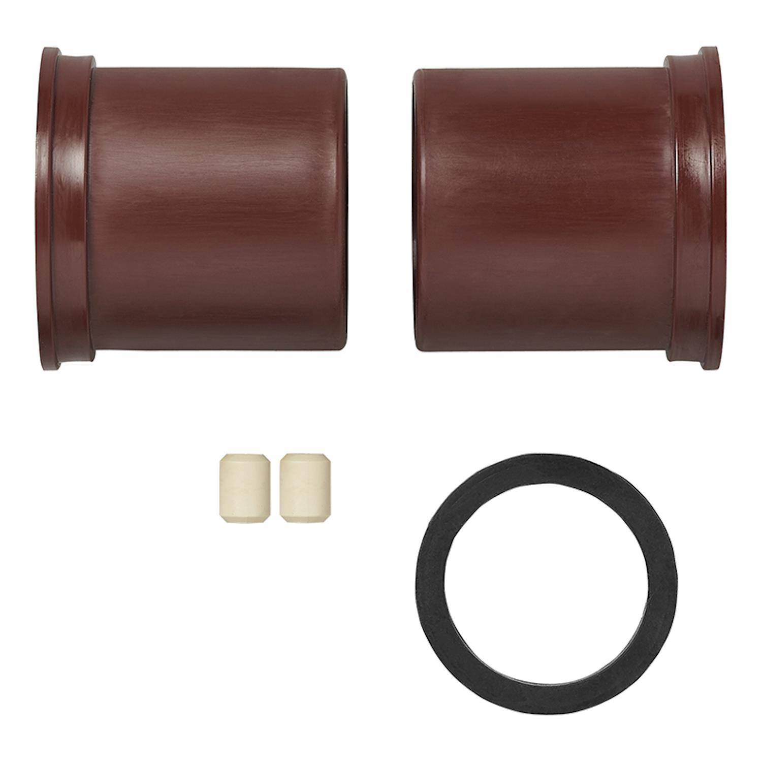 Zwei braune zylindrische Objekte, zwei kleine beige Zylinder und ein schwarzer kreisförmiger Ring, auf einem weißen Hintergrund angeordnet.