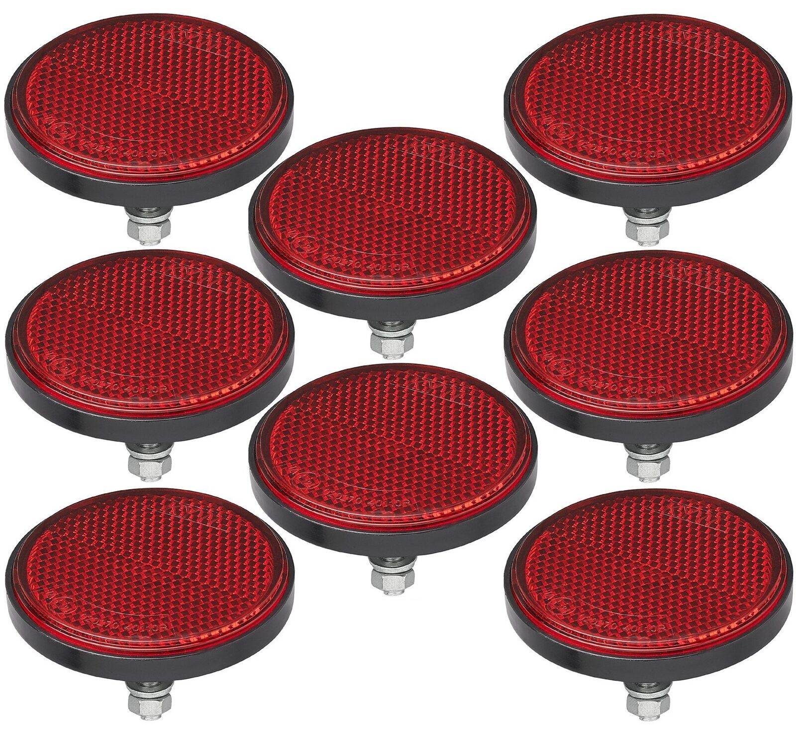 Acht rote kreisförmige Reflektoren mit strukturierten Oberflächen und angebrachten Metallschrauben sind gleichmäßig auf einem weißen Hintergrund verteilt.