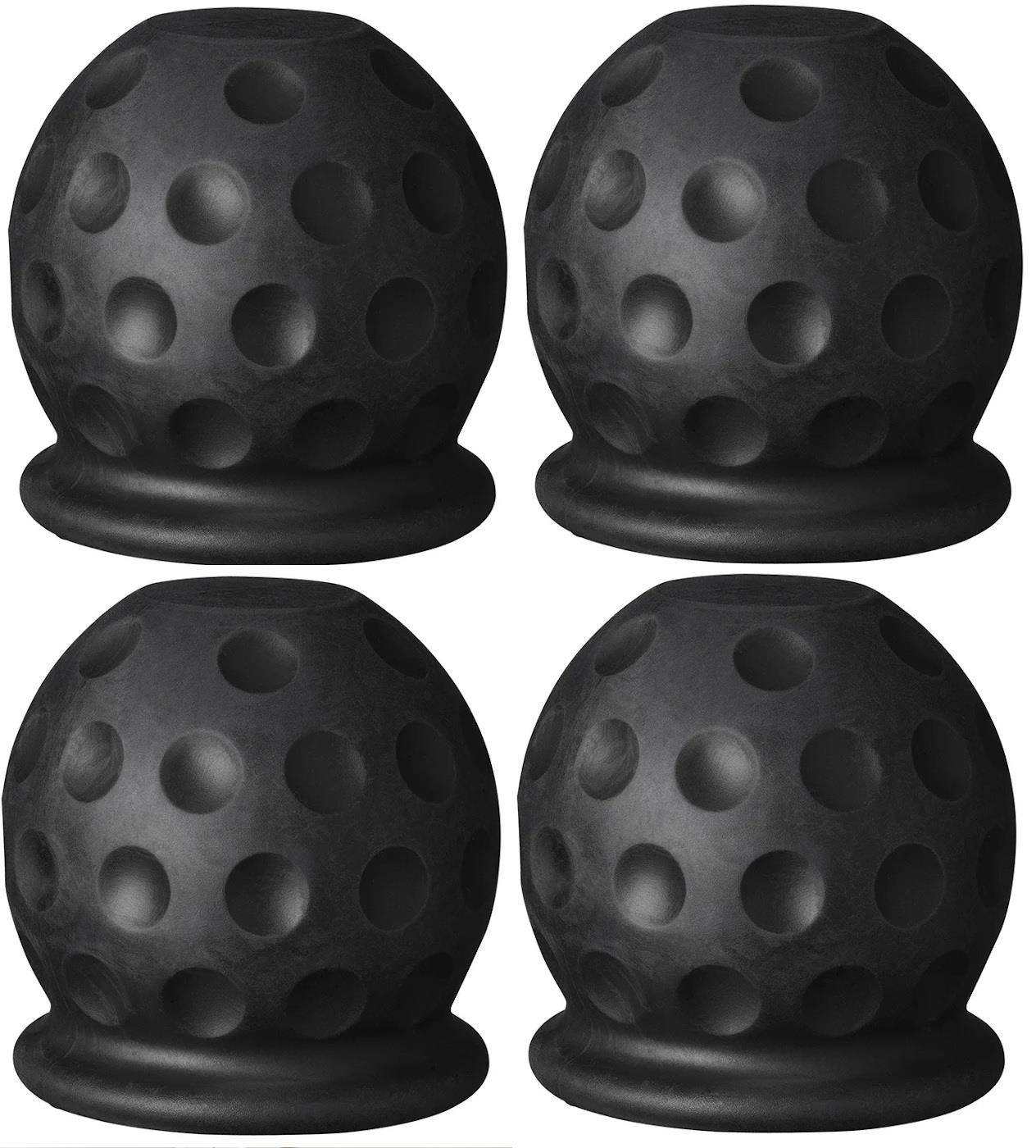 Vier schwarze runde Objekte mit einer genoppten Textur, die Golfbällen ähneln. Sie sind in einem gleichmäßigen 2x2 Raster angeordnet.