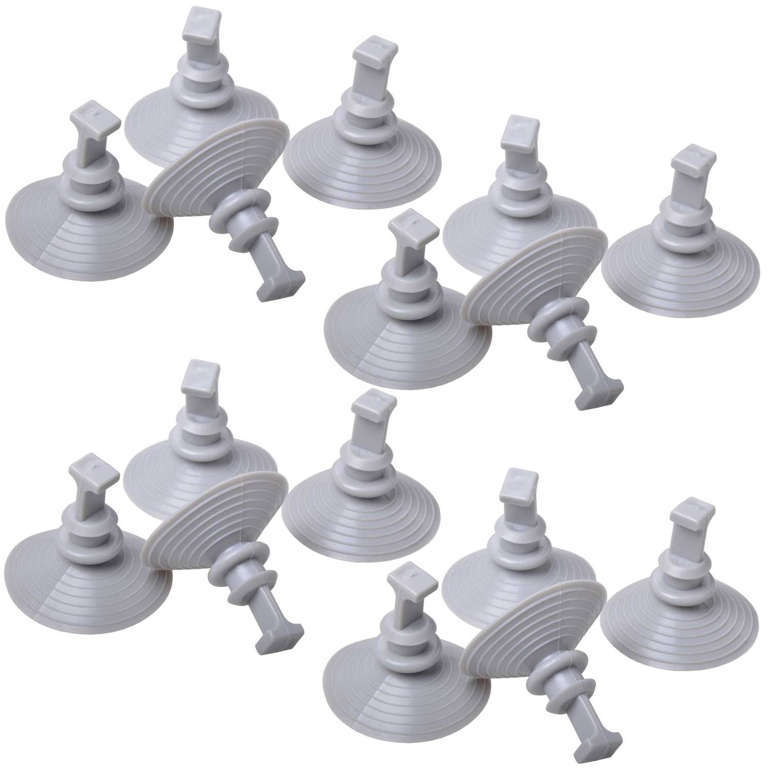 Eine Sammlung von grauen Gummisaugnapfhaltern, in Reihen angeordnet, die zum Greifen oder Anheben glatter Oberflächen verwendet werden.