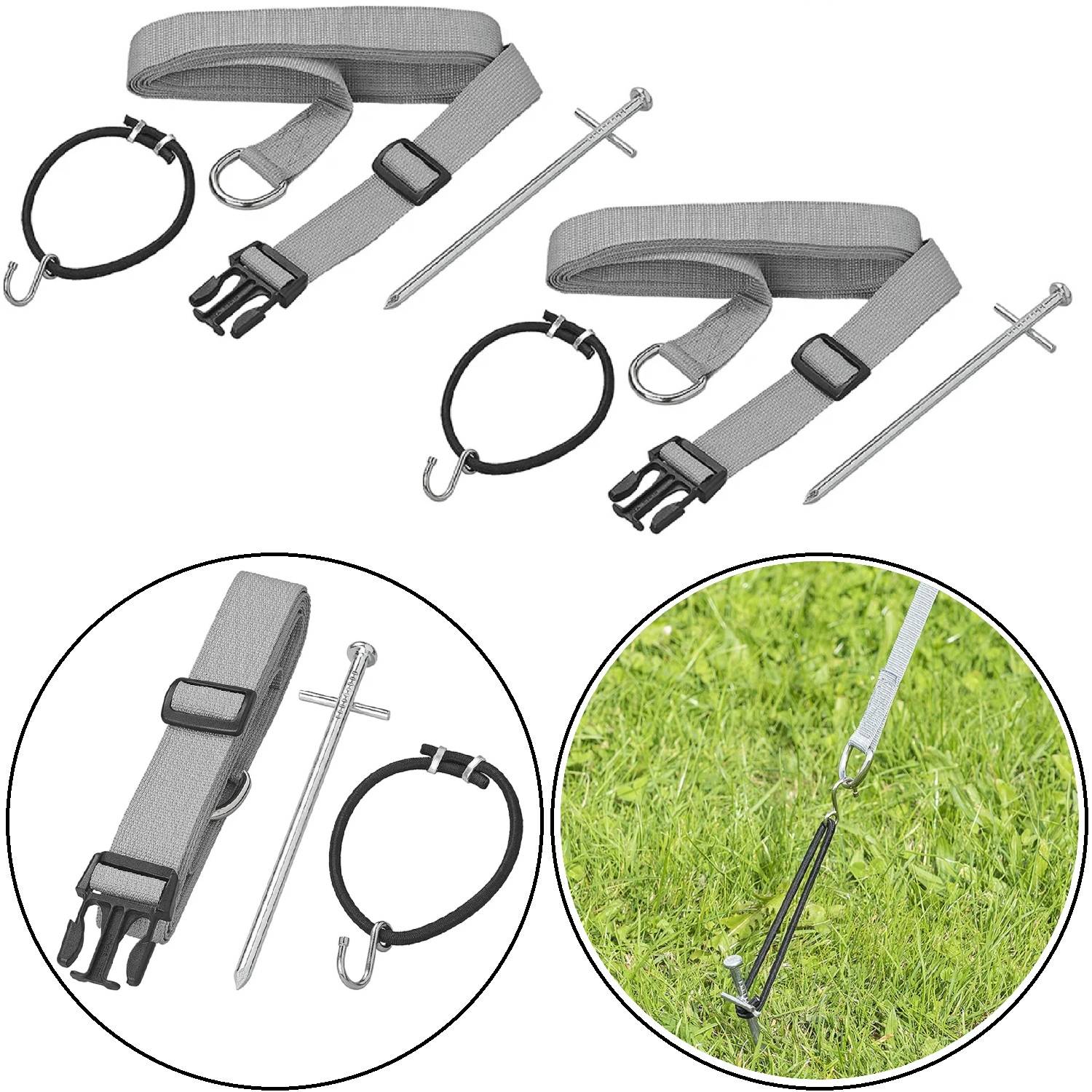 Bodenverankerungsset mit zwei grauen Spanngurten, Metallheringen und Haken. Dient zur Befestigung von Outdoor-Gegenständen wie Zelten oder Möbeln auf Rasen.