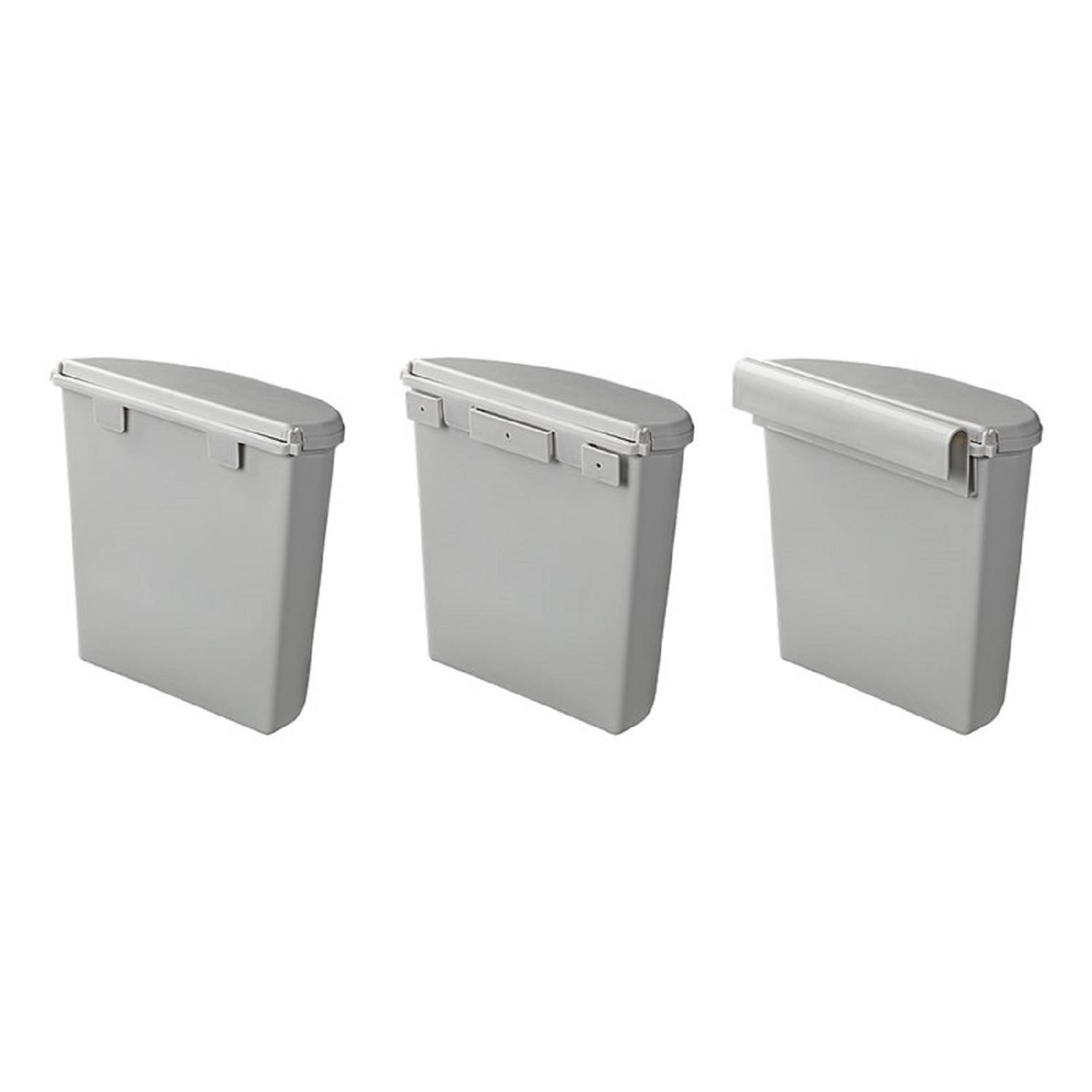 Drei geschlossene graue rechteckige Behälter in unterschiedlichen Größen sind in einer Reihe vor einem schlichten Hintergrund aufgestellt.