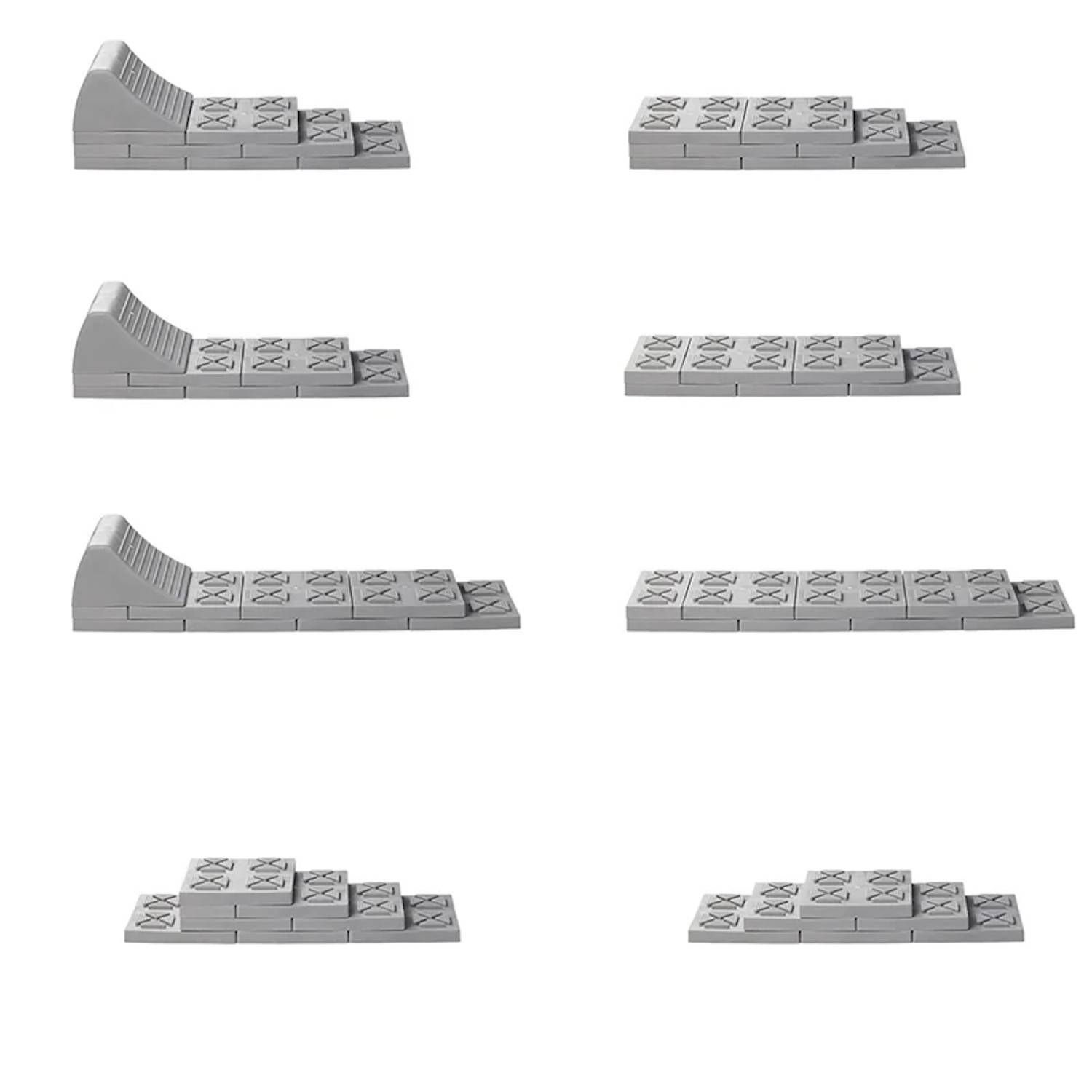 Acht graue, trapezförmige Plastikstücke in Paaren angeordnet, die verschiedene Verschachtelungsformationen zeigen.