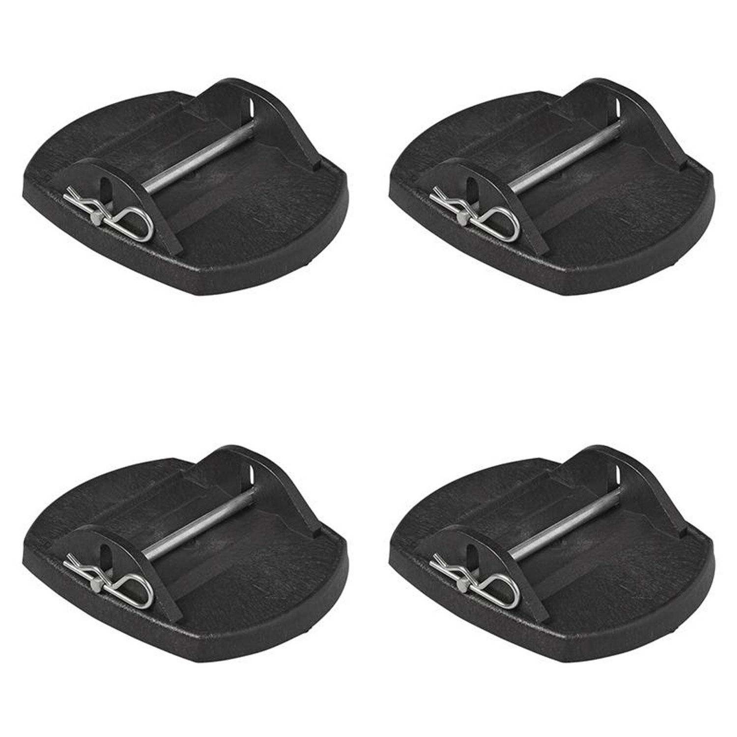 Vier schwarze Stützbockauflagen, jede mit einem Metallbolzen, sind in einem quadratischen Muster angeordnet. Sie werden zur Niveauregulierung von Wohnmobilen verwendet.