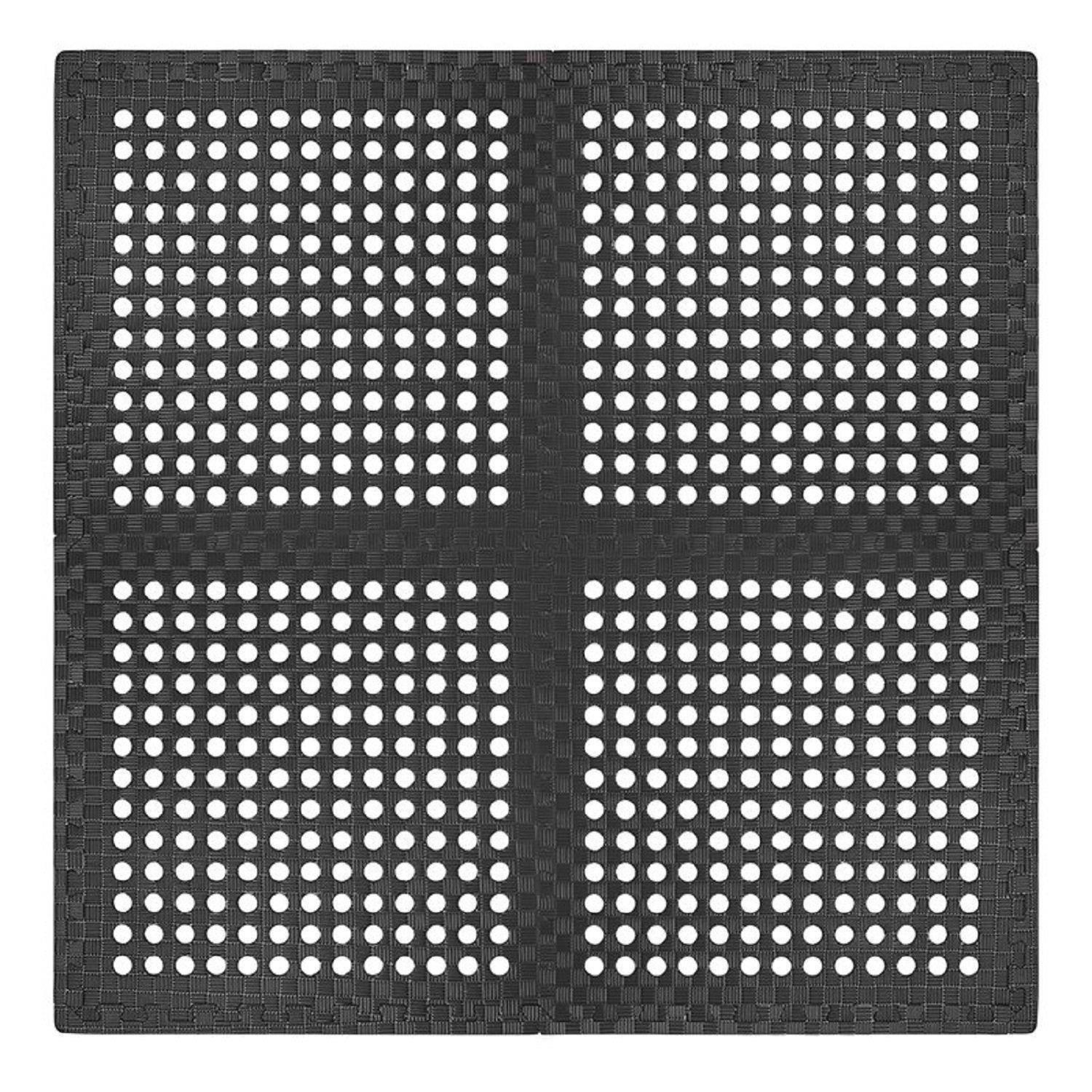 Ein schwarzes quadratisches Matte mit einem Raster aus kreisförmigen Löchern, die in vier Abschnitten angeordnet sind.