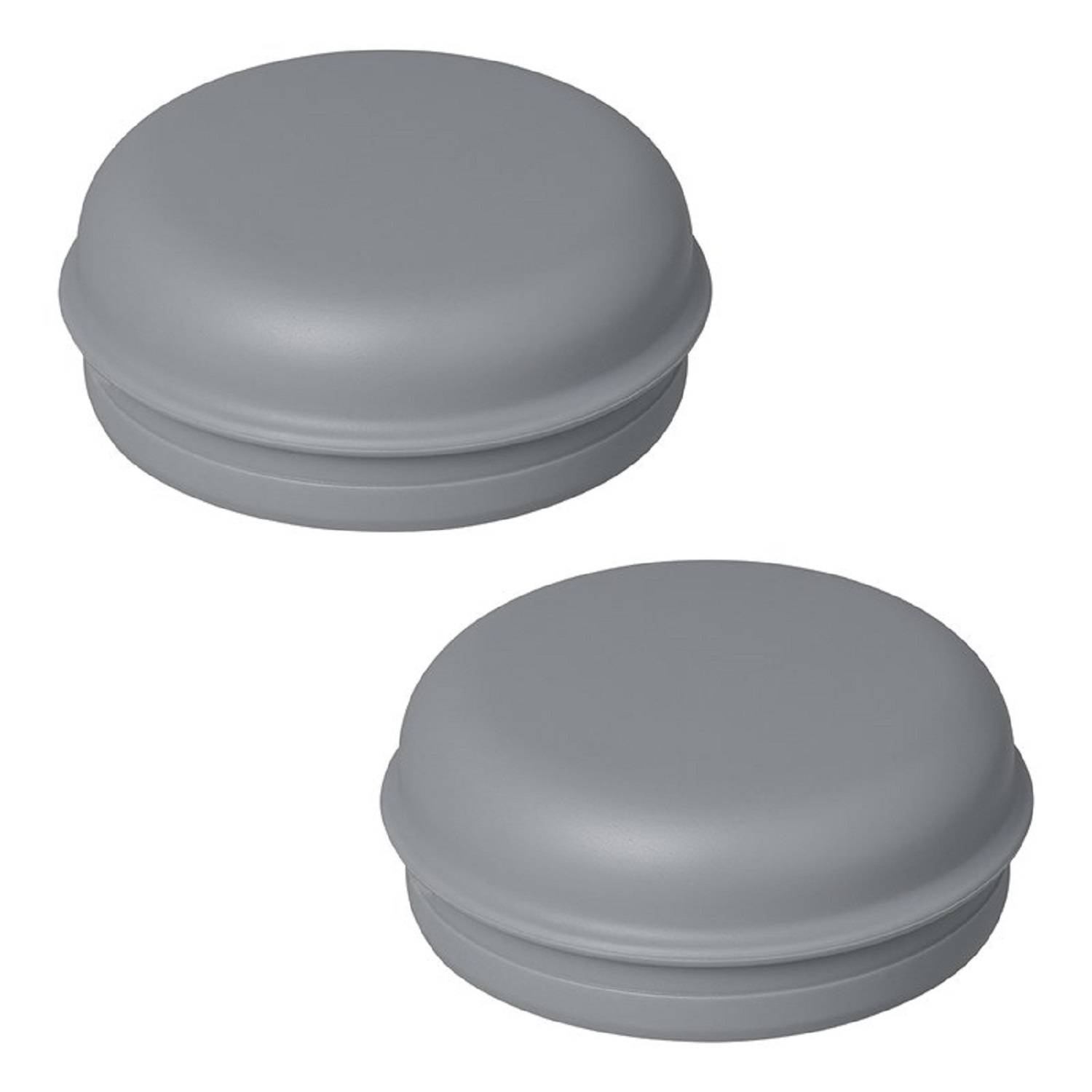 Zwei graue Gummistopfen auf einem weißen Hintergrund.